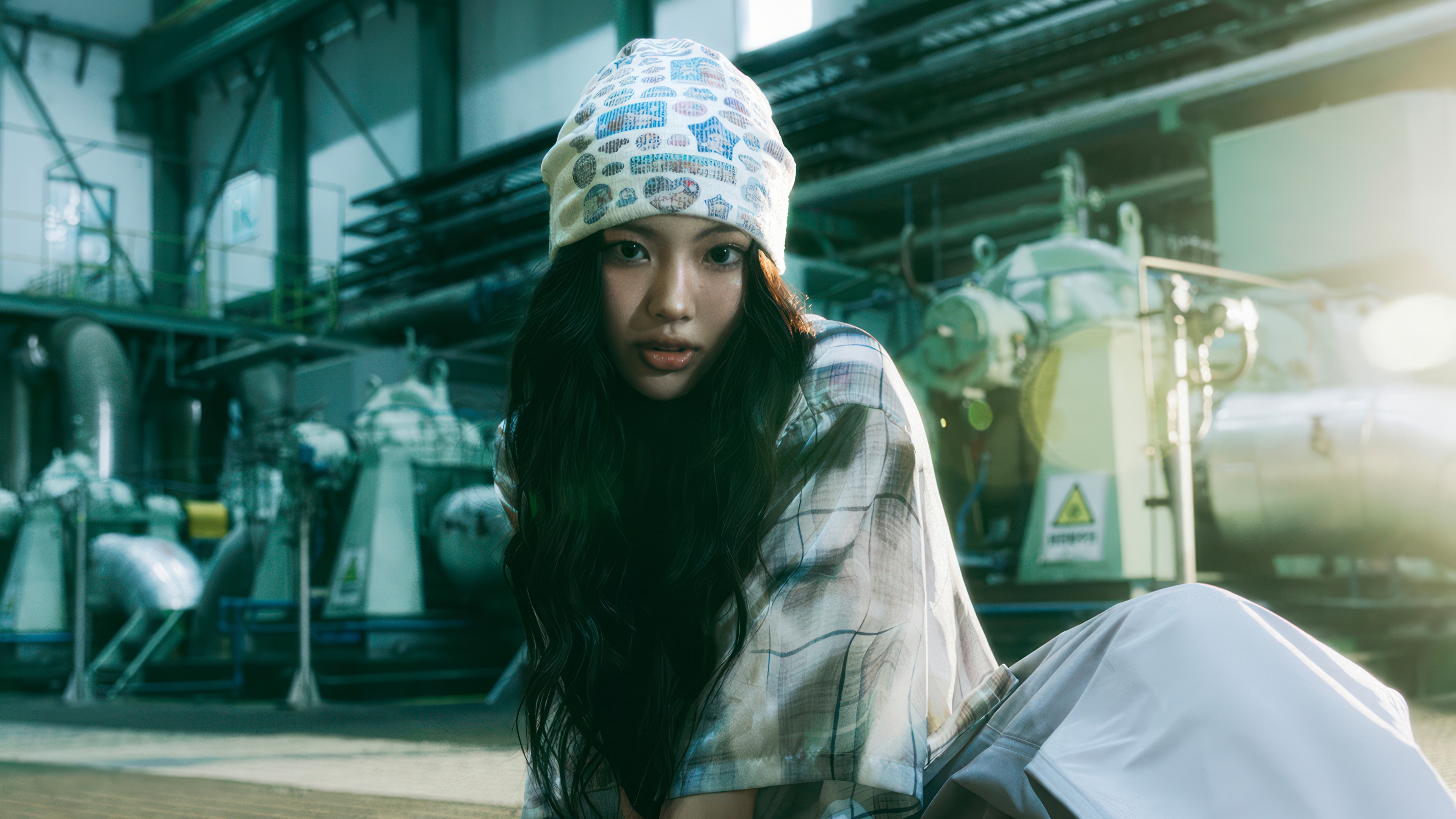 Hyein from NewJeans in an industrial setting HD Wallpaper
