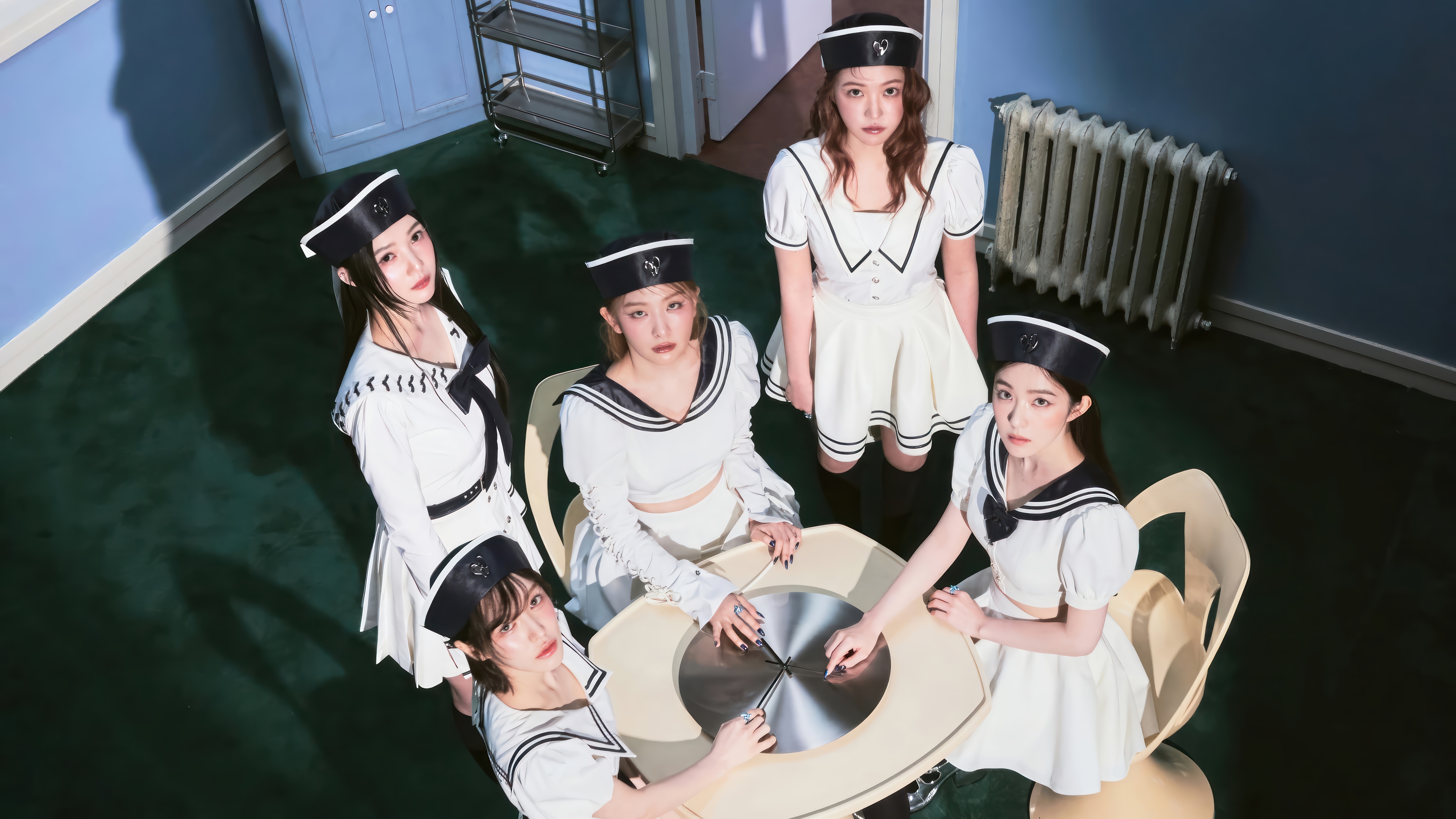 Red Velvet members in sailor outfits around a table HD Wallpaper