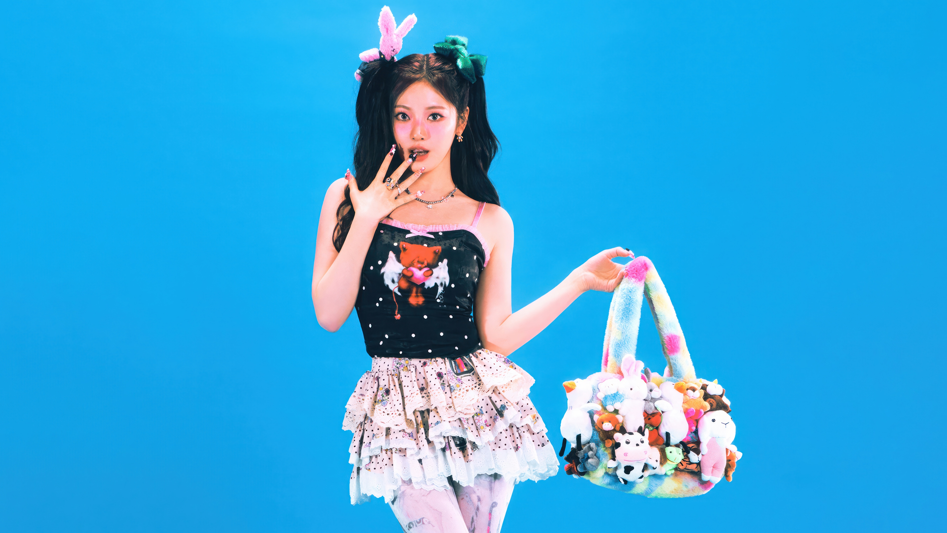 Ningning from Aespa with a stuffed animal bag HD Wallpaper