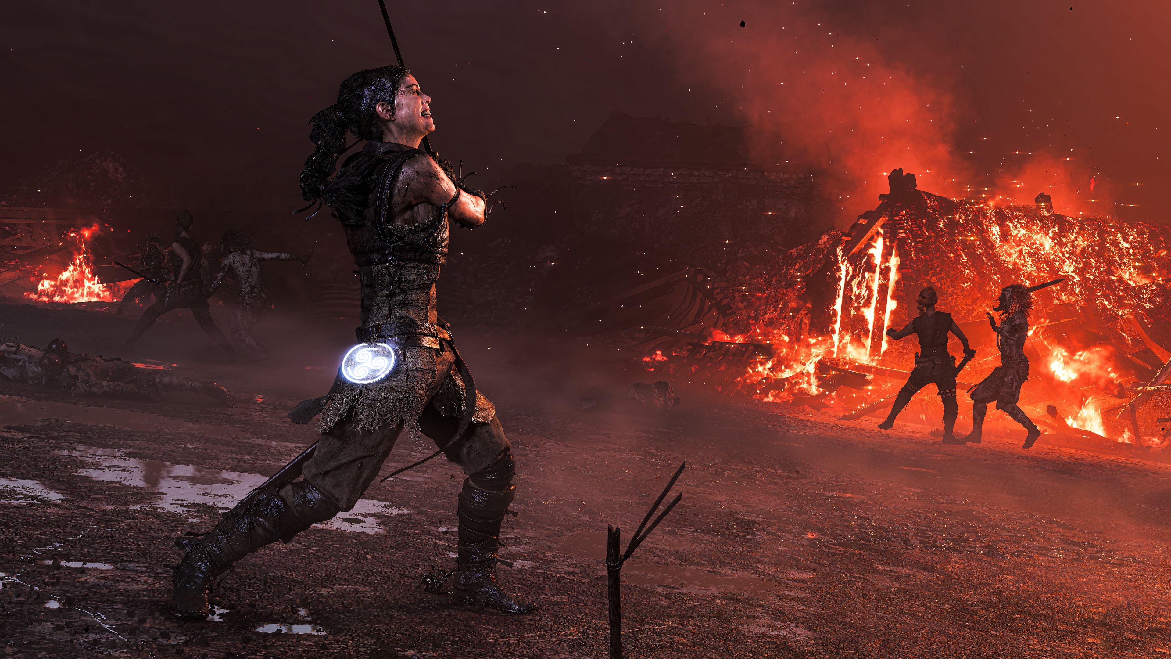 Woman fighting in a burning village HD Wallpaper