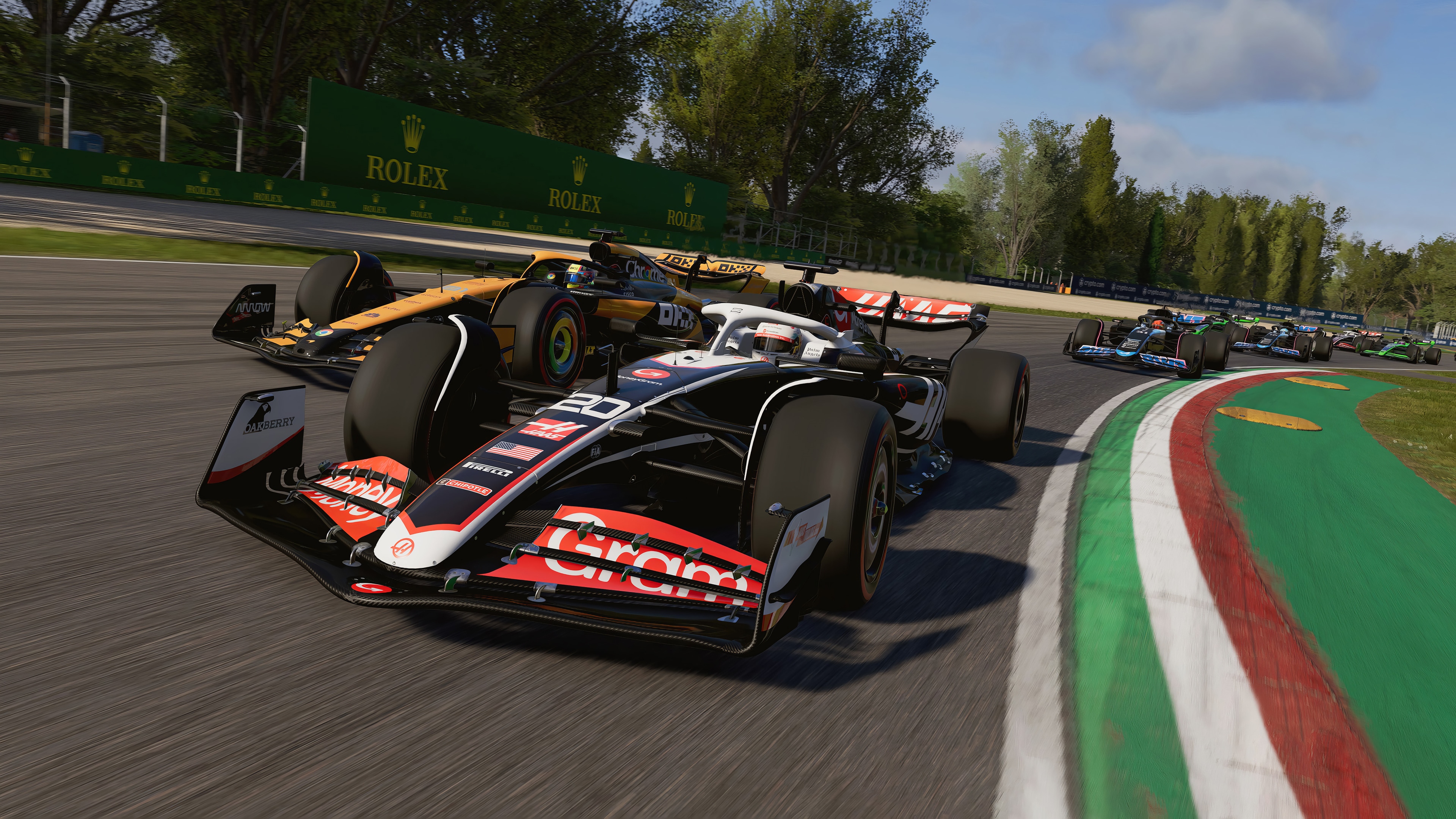F1 24 Racing Cars on Track HD Wallpaper