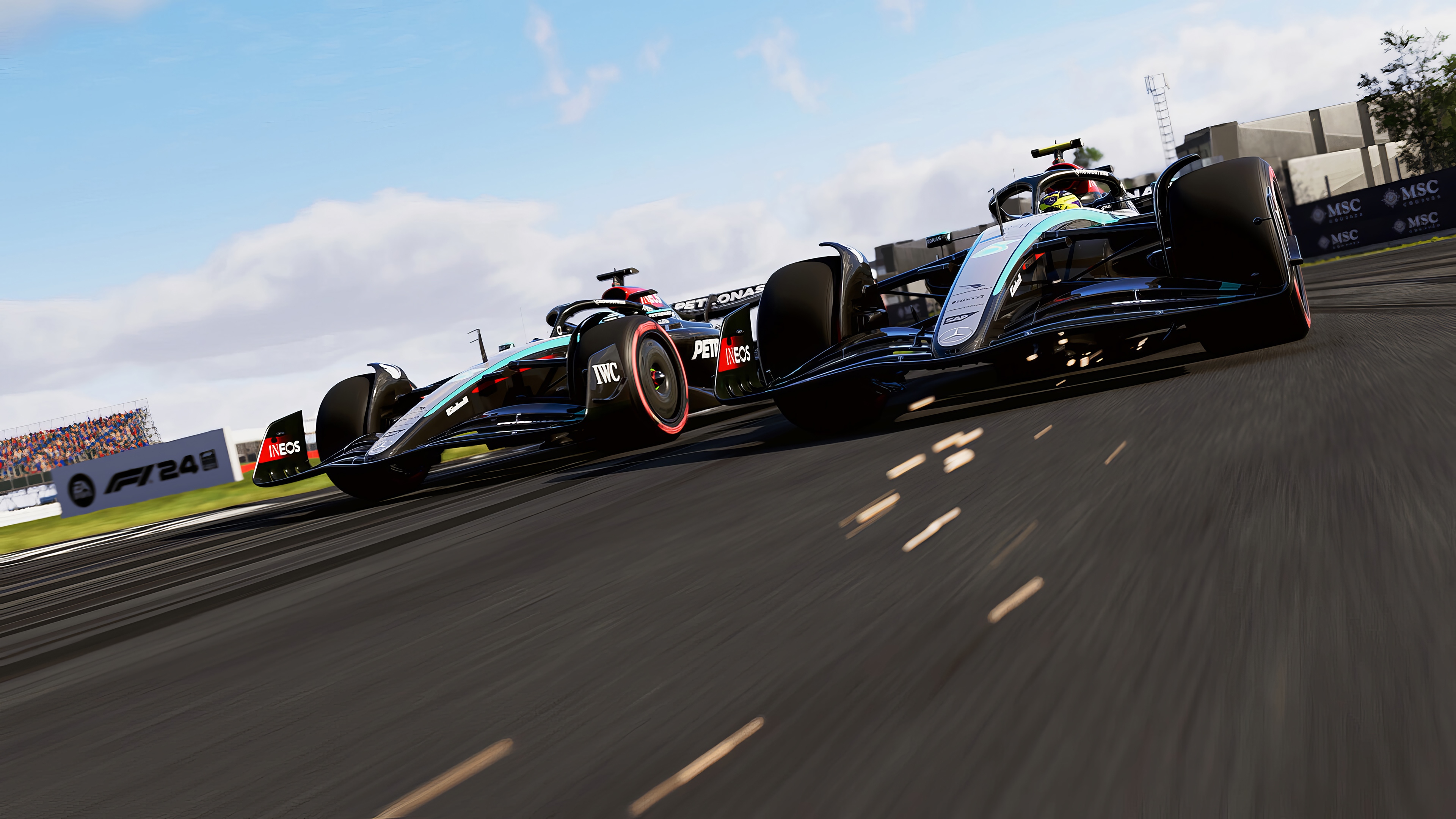 F1 24 Racing Cars on Track HD Wallpaper