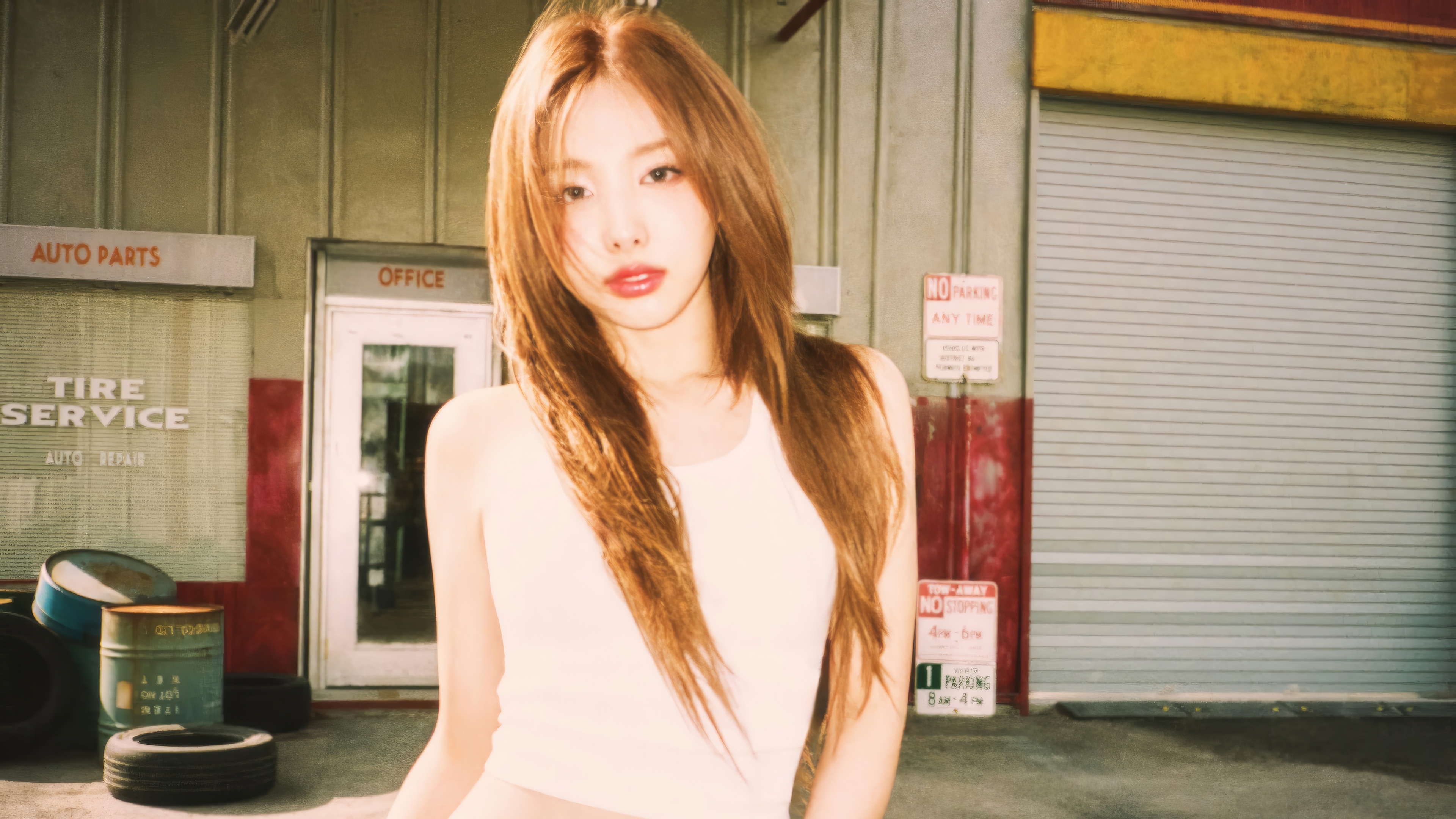 Nayeon from TWICE in a garage setting HD Wallpaper
