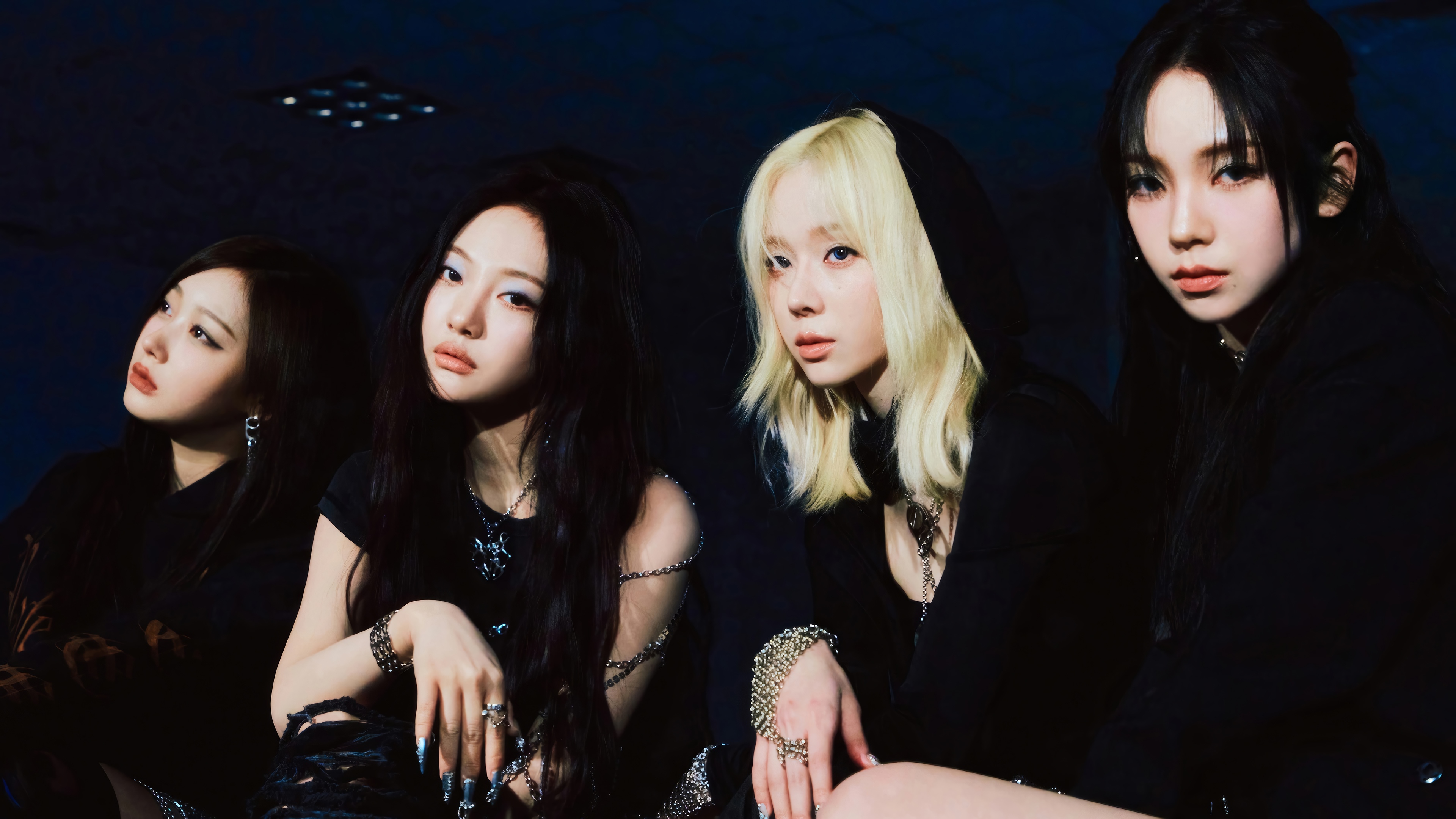 Aespa members Karina, Winter, Ningning, and Giselle in dark attire HD Wallpaper