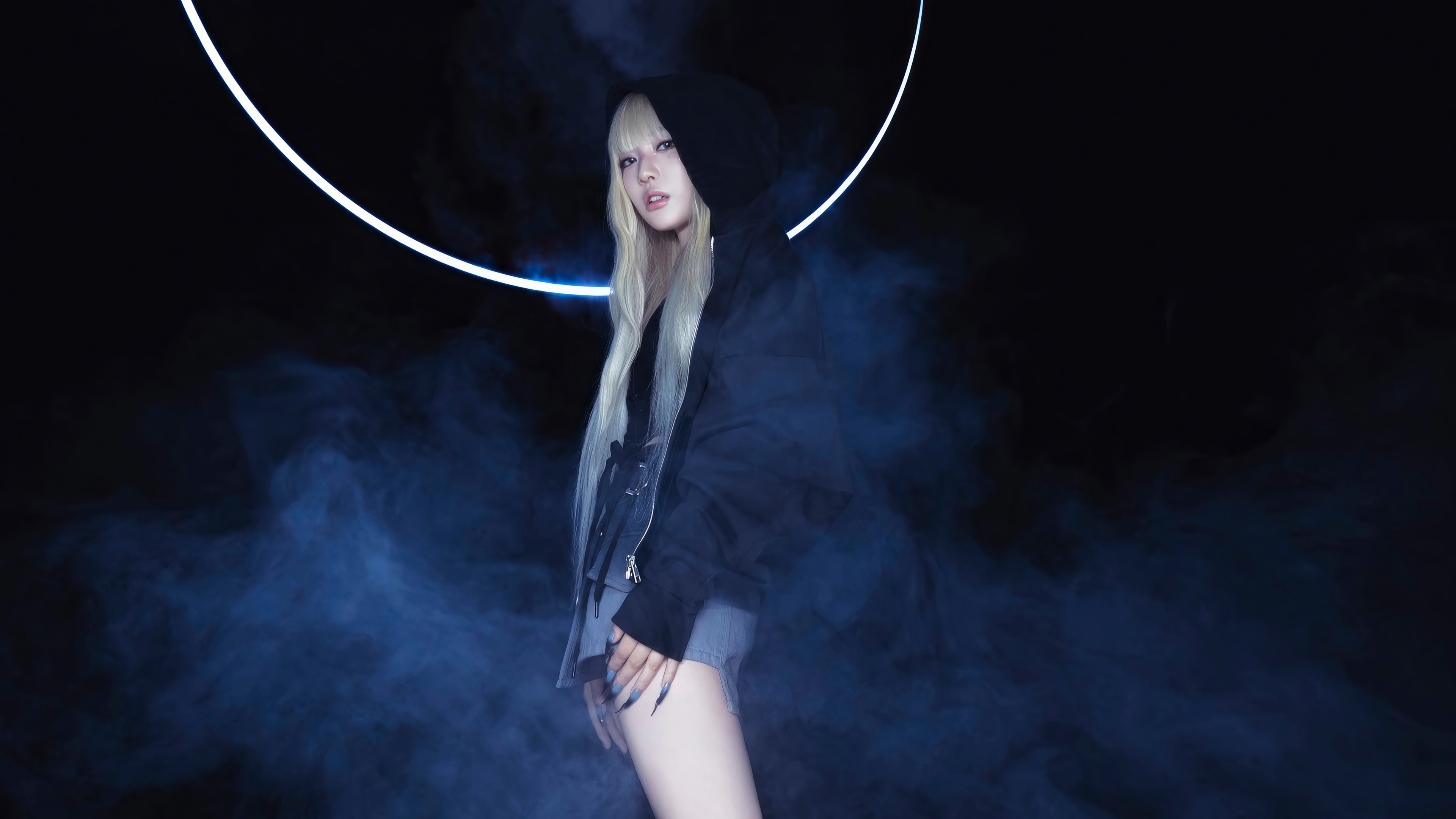 Ningning from Aespa in a dark, smoky setting with a neon ring HD Wallpaper