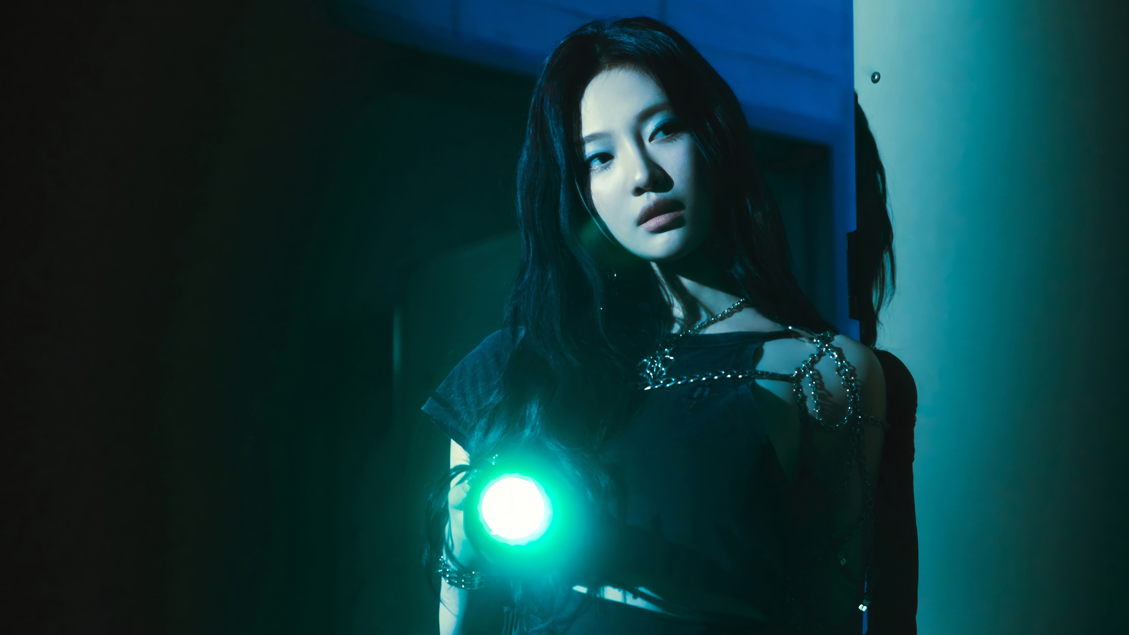 Ningning from Aespa holds a green flashlight HD Wallpaper