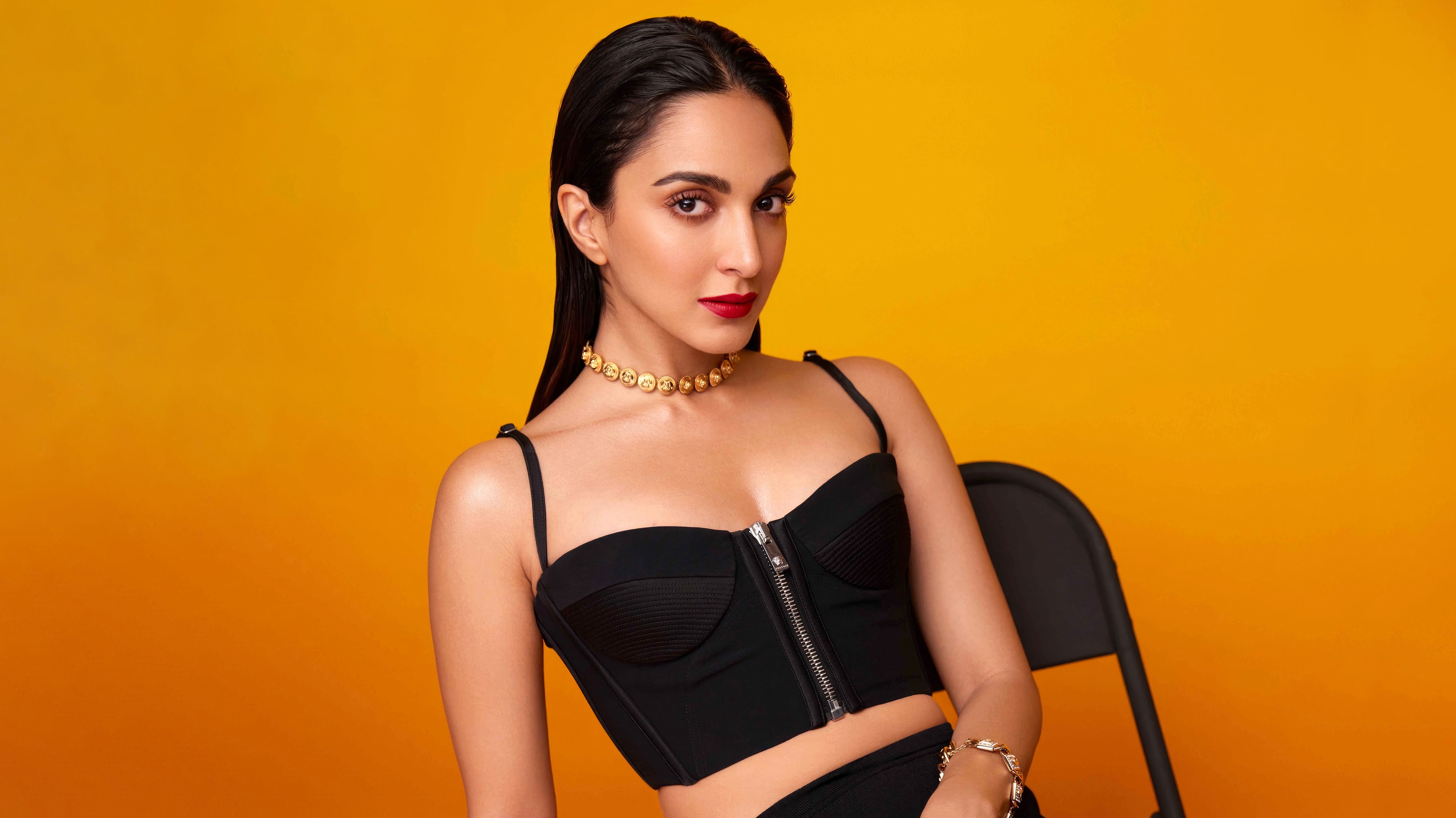 Kiara Advani in a black corset with a gold necklace HD Wallpaper