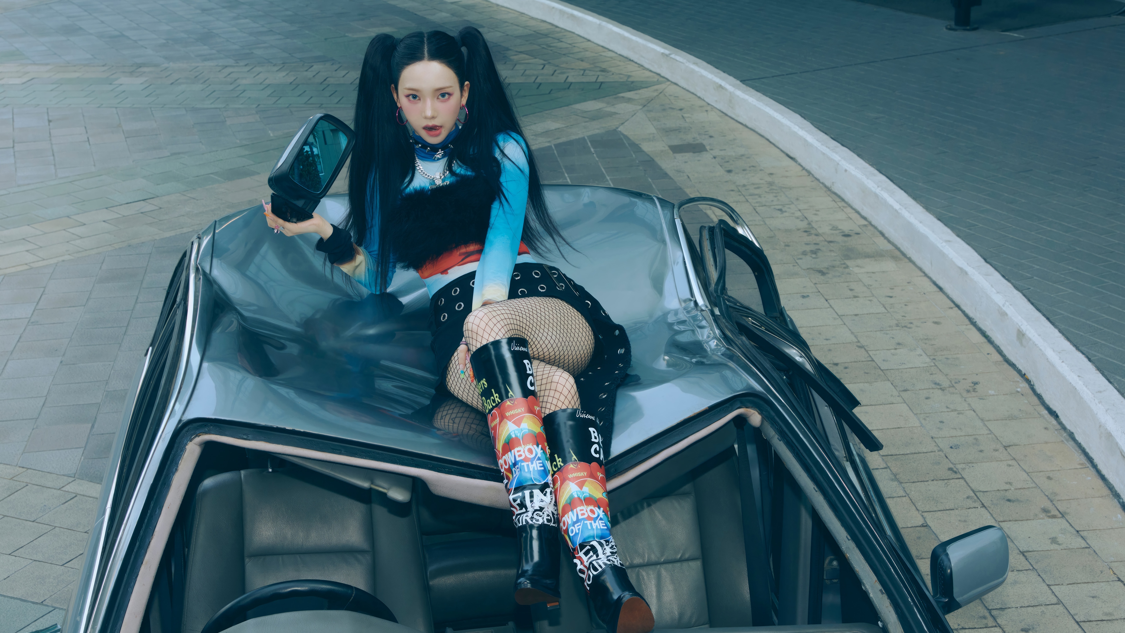 Karina from Aespa sitting on a car HD Wallpaper