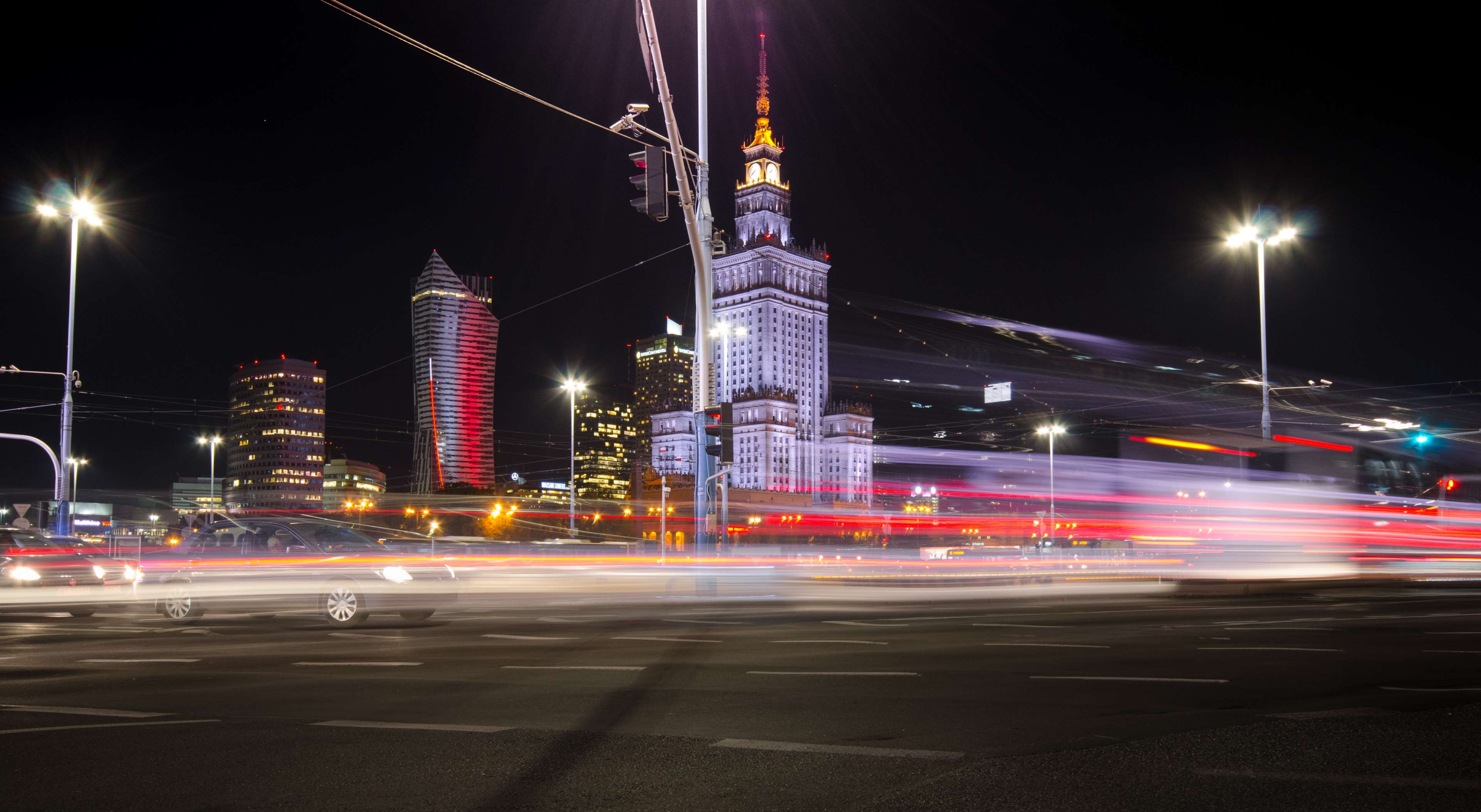 Night cityscape of Warsaw with light trails from traffic HD Wallpaper