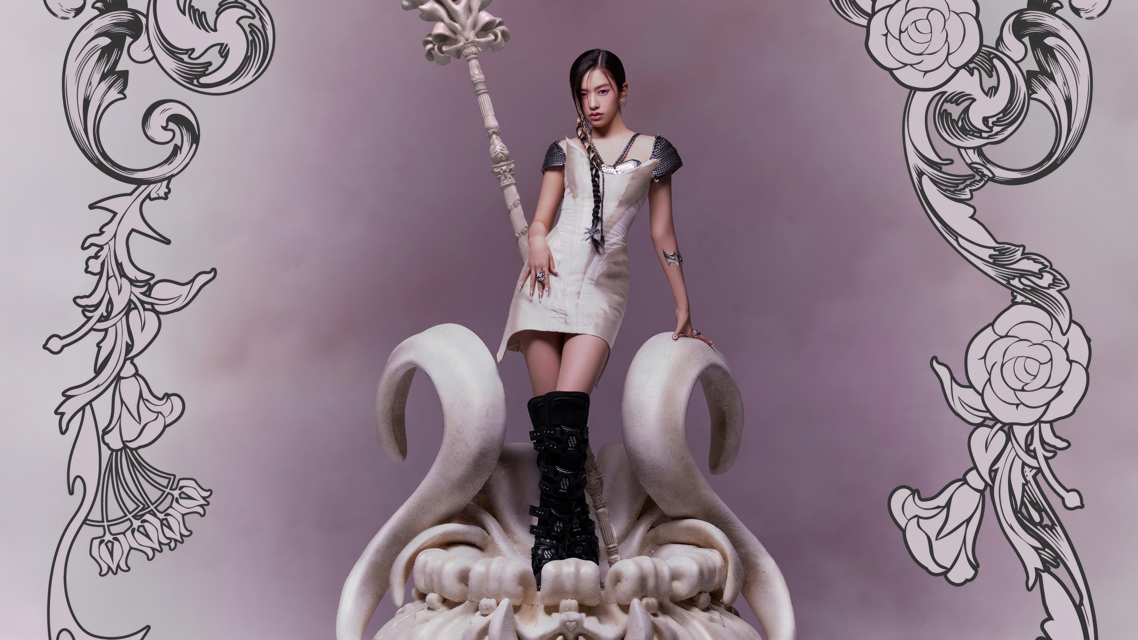 Yujin from IVE posing with a staff on a sculpture HD Wallpaper