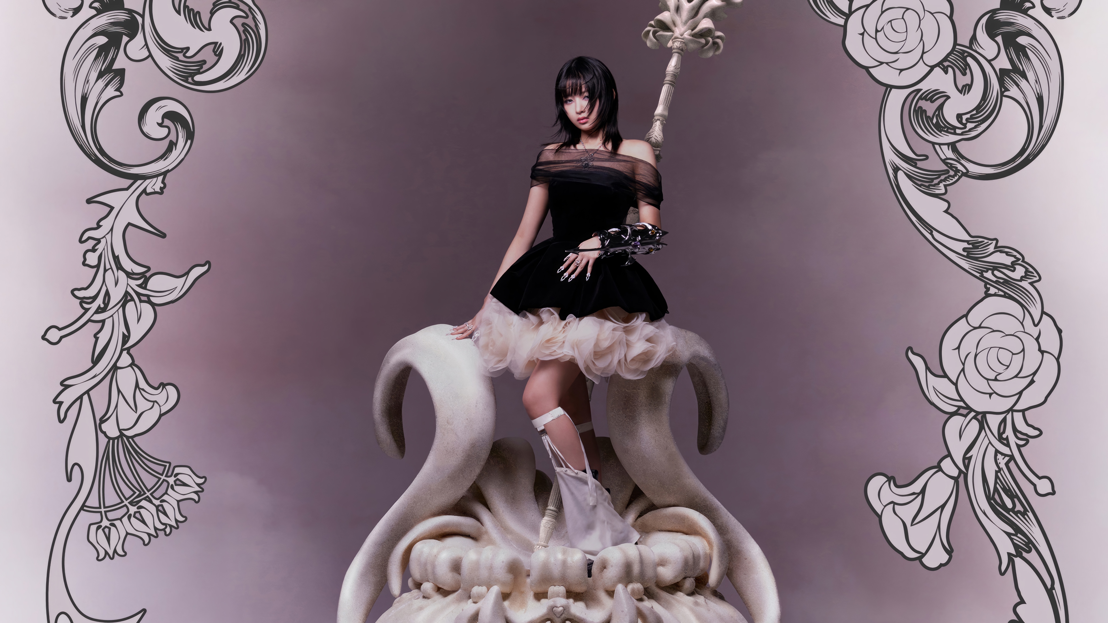 Rei from IVE sitting on a sculpture HD Wallpaper