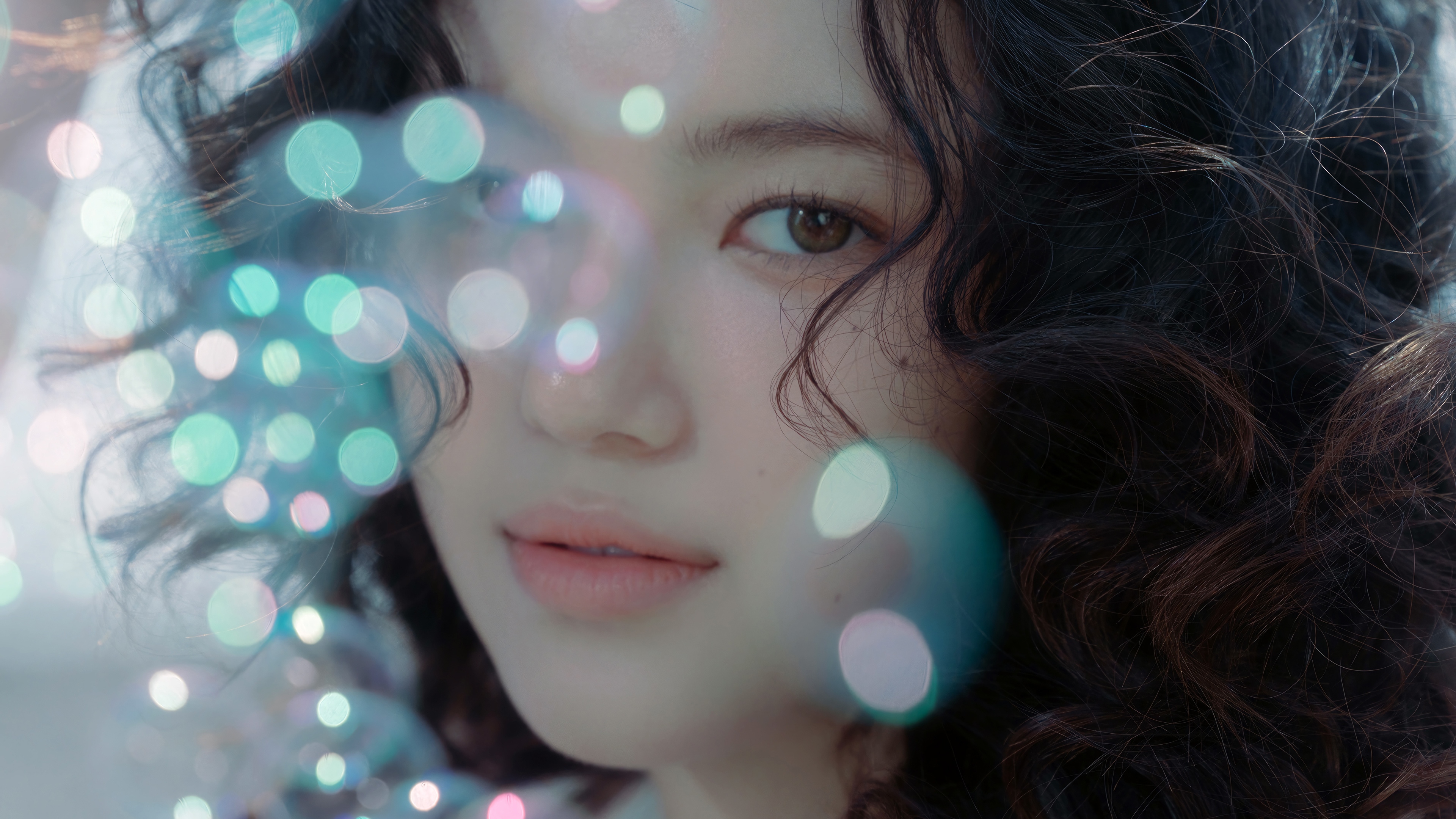 Danielle from NewJeans with bokeh lights HD Wallpaper