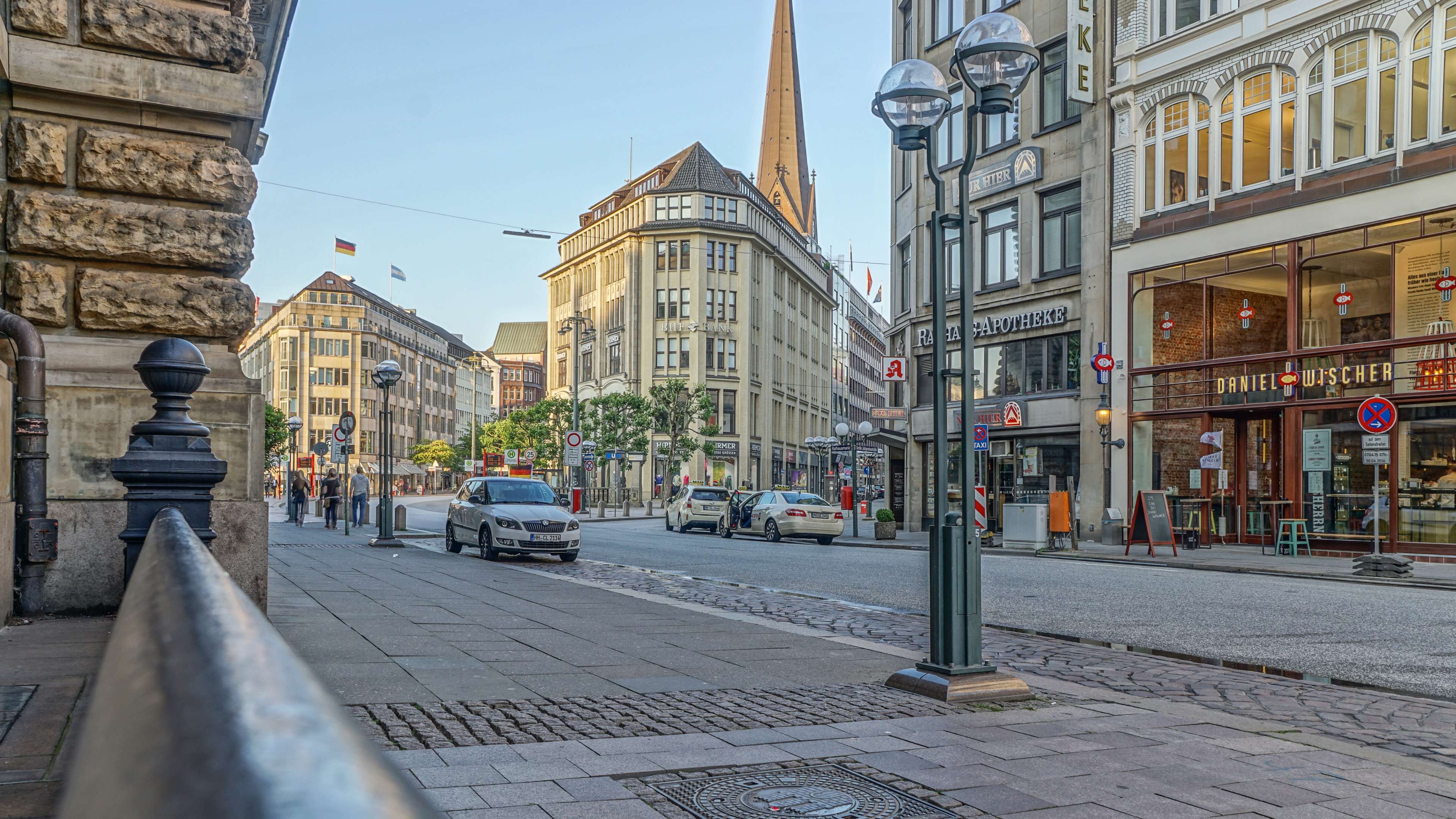 City street in Hamburg, Germany with buildings and cars HD Wallpaper