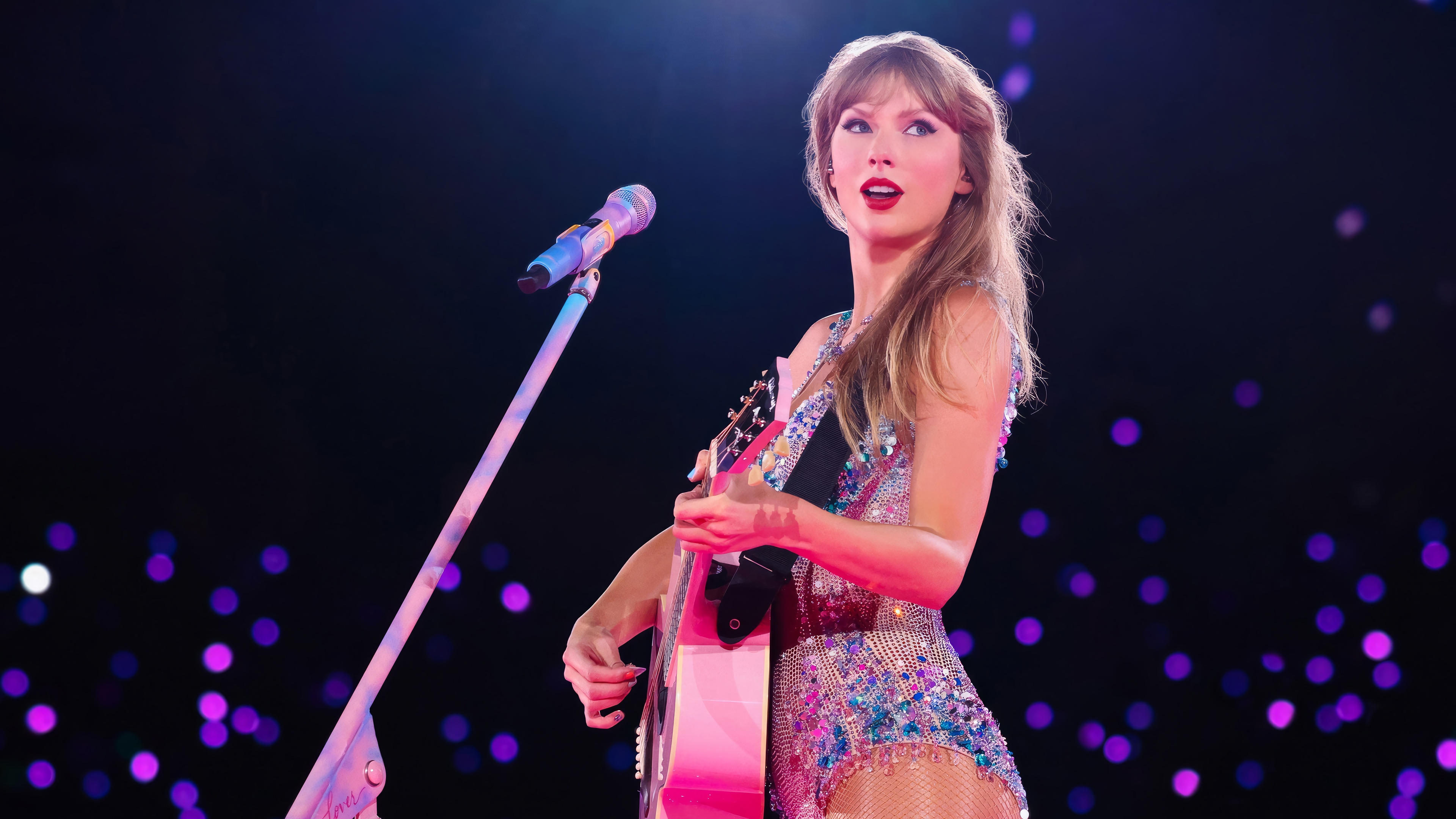 Taylor Swift performing on The Eras Tour in 4K HD Wallpaper