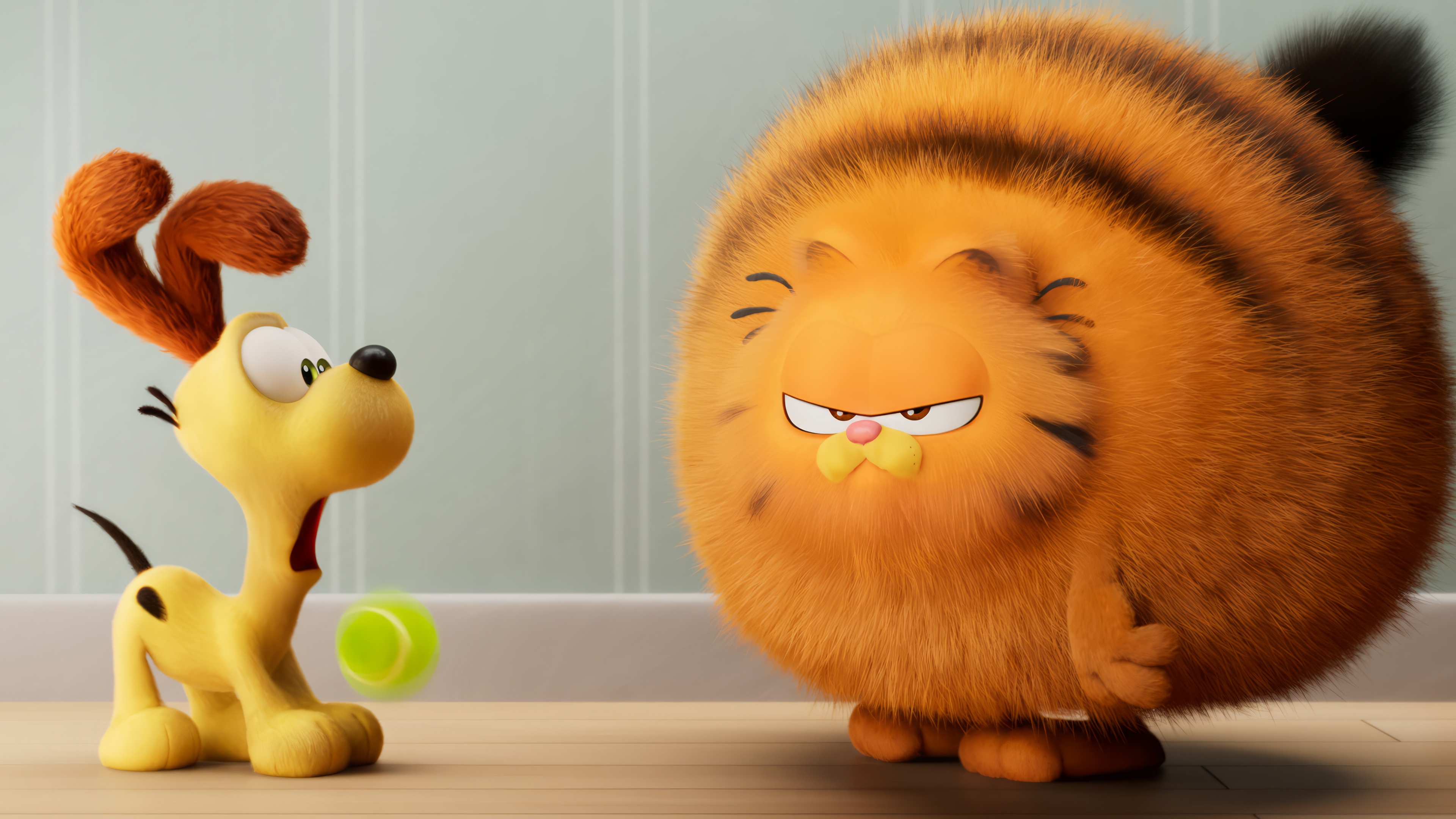 Garfield and Odie with a tennis ball HD Wallpaper