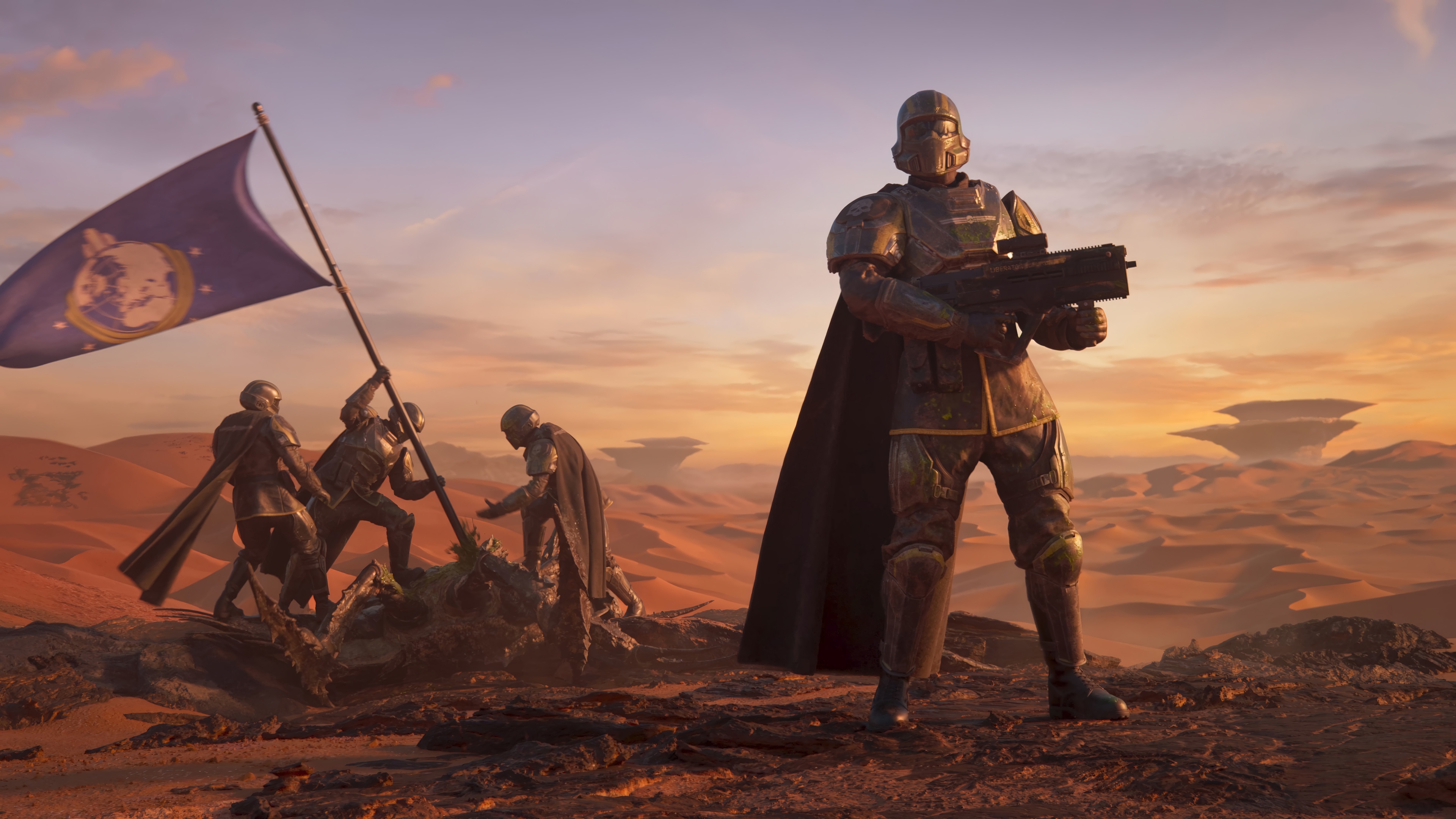 Helldivers 2 soldiers planting a flag on a desert planet HD Wallpaper