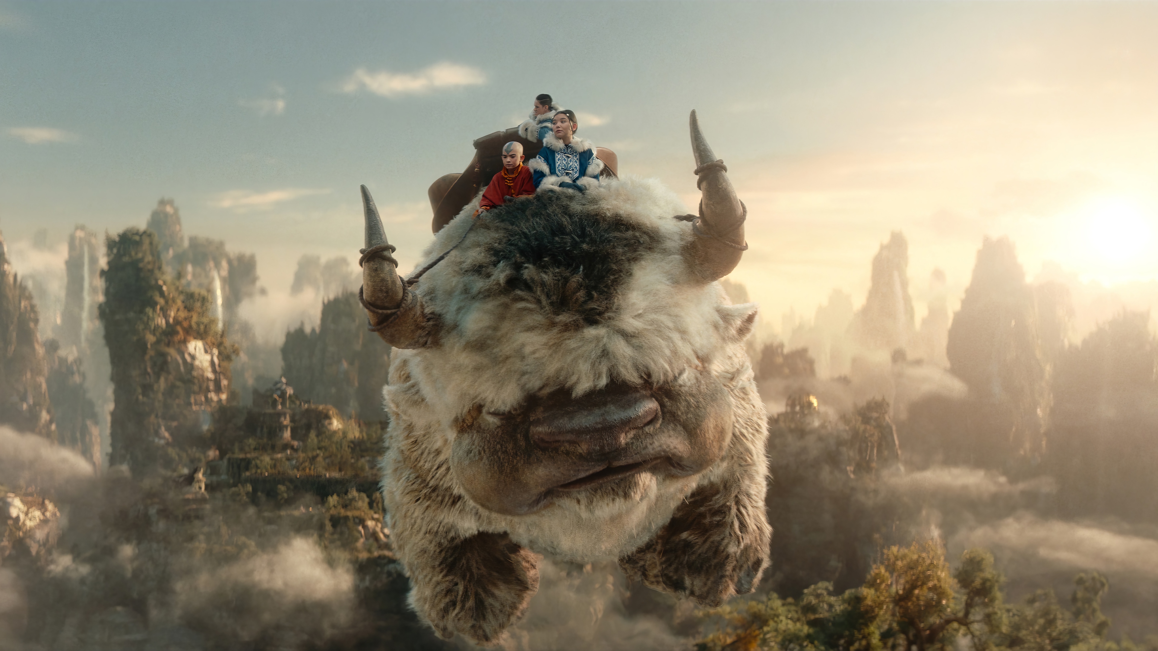 Aang, Sokka, and Katara ride Appa in 4K HD Wallpaper