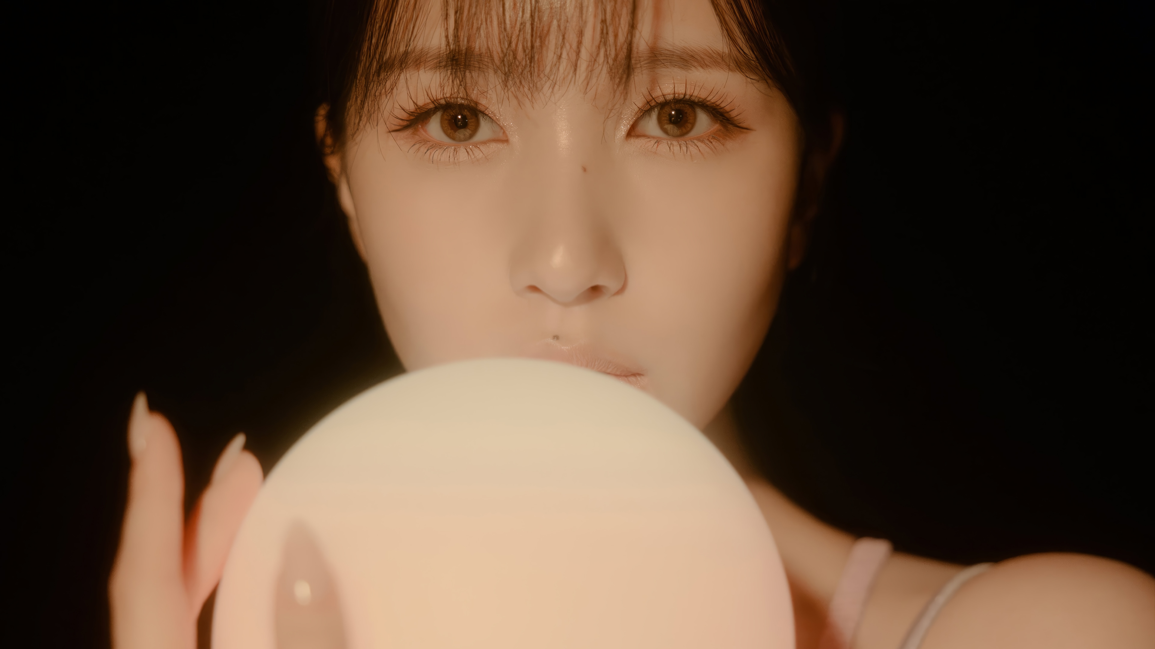 Mina from TWICE holding a glowing orb HD Wallpaper