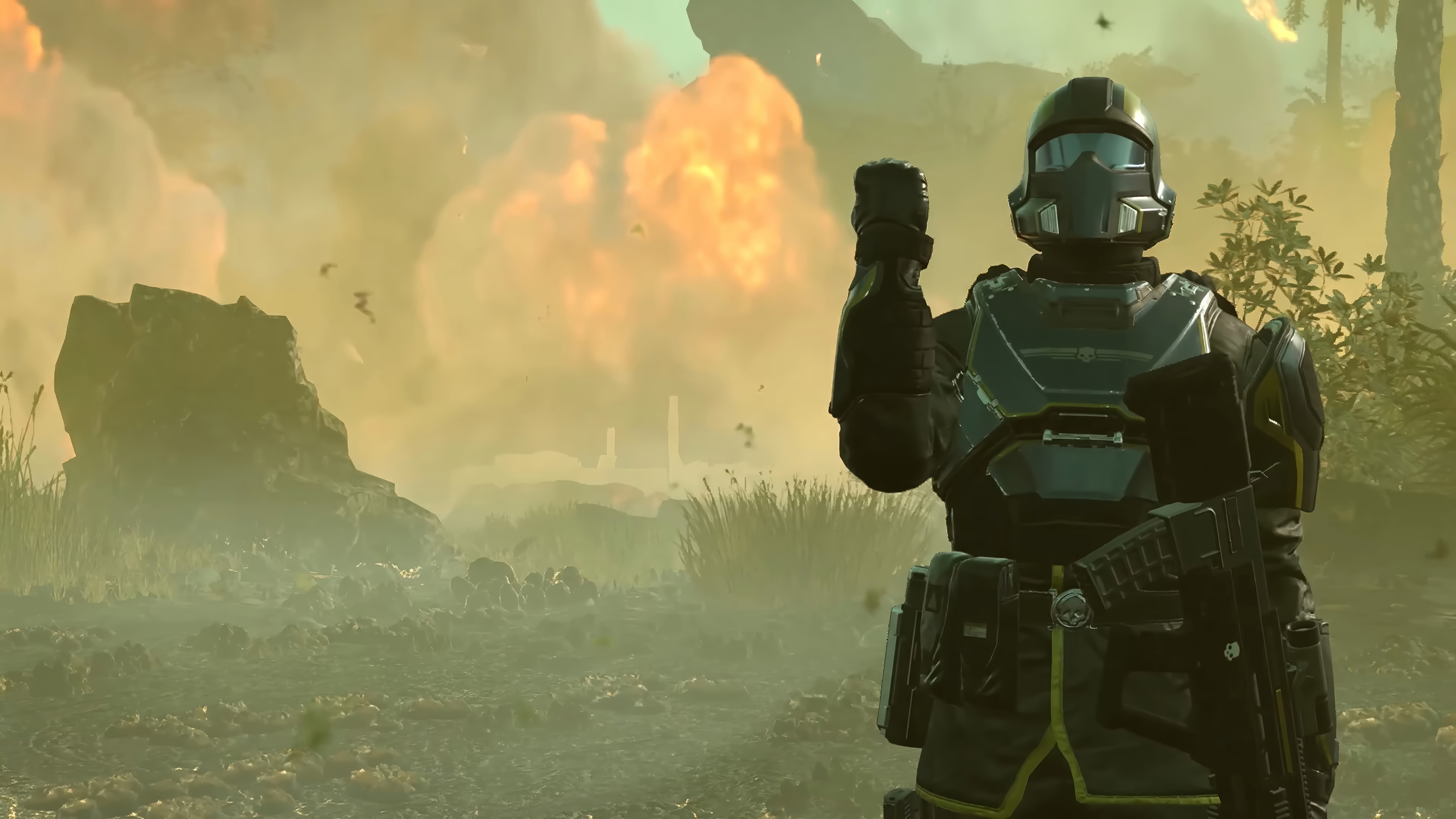 Helldivers 2 soldier in a jungle with explosions HD Wallpaper