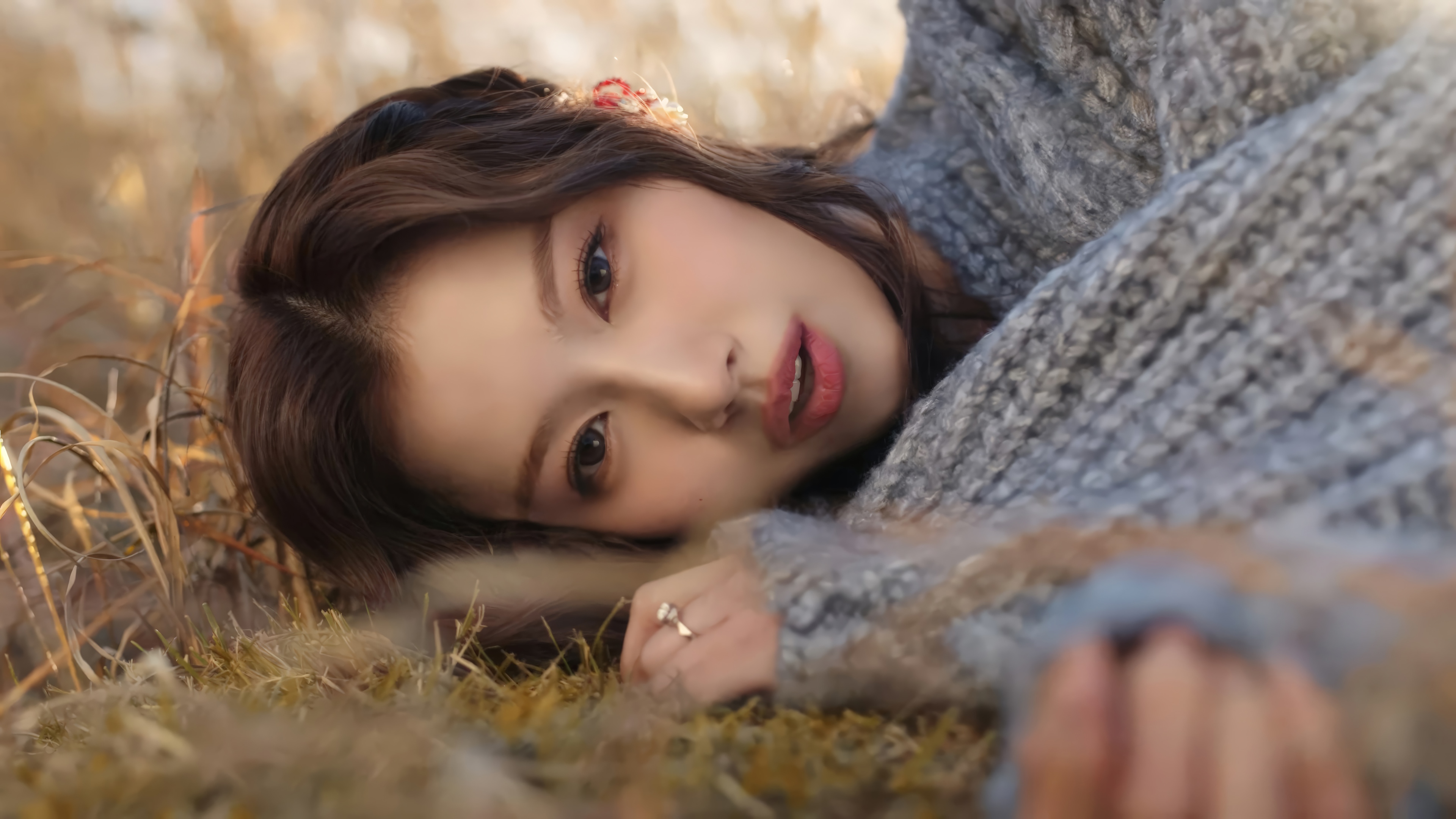 Sana from TWICE lying in grass HD Wallpaper