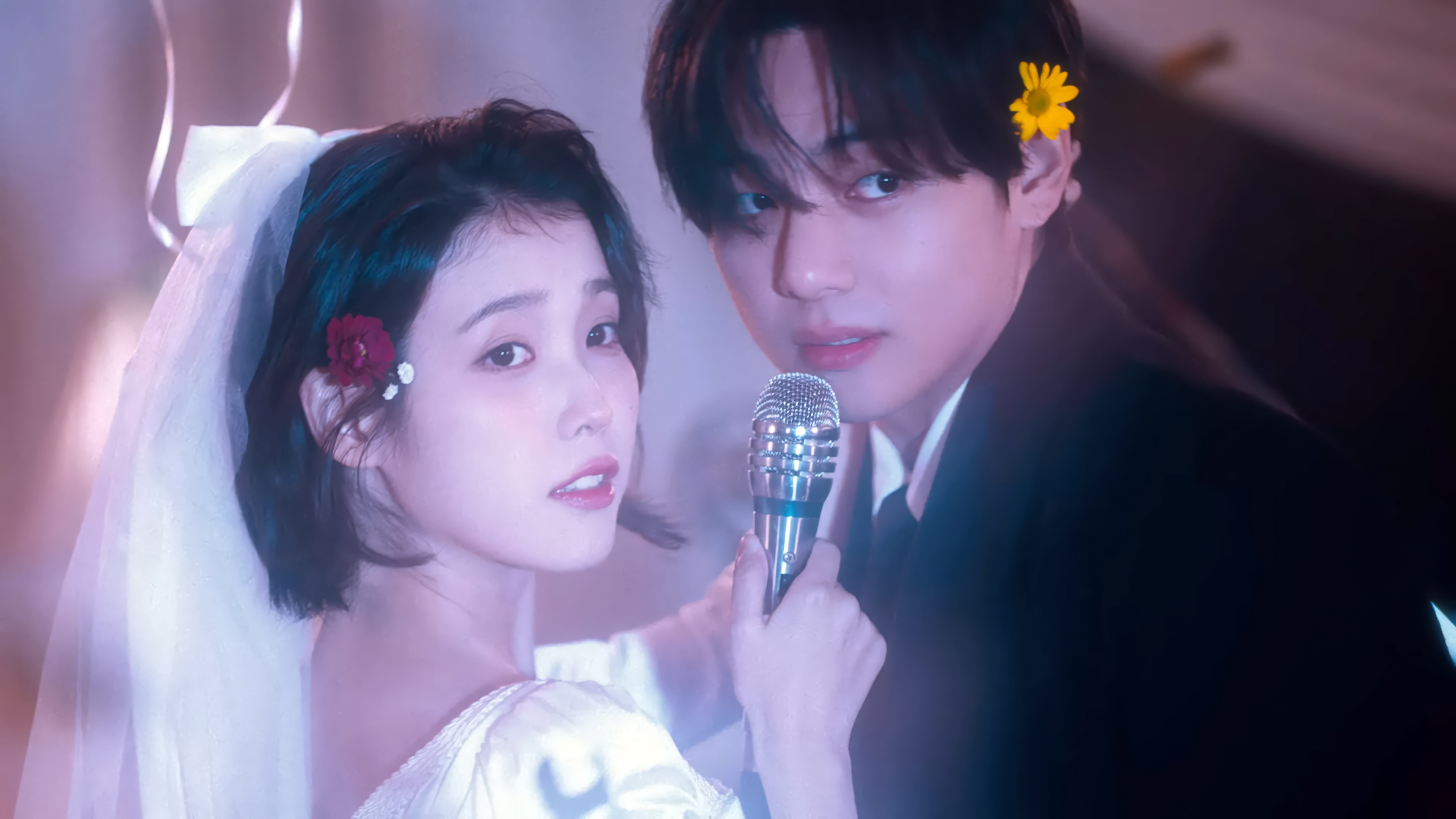IU and V from BTS in a music video HD Wallpaper