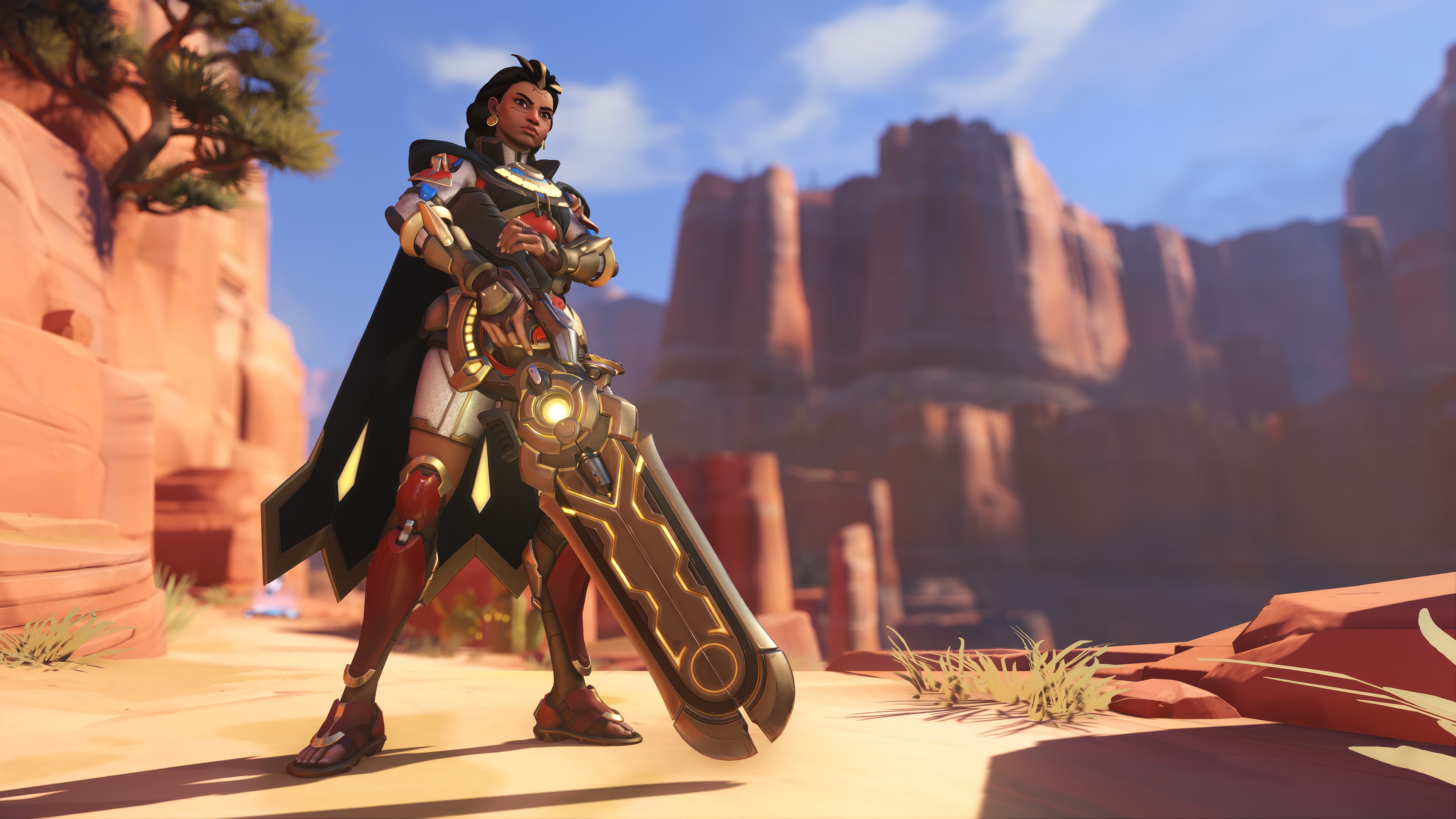 Illari from Overwatch 2 in a desert landscape HD Wallpaper