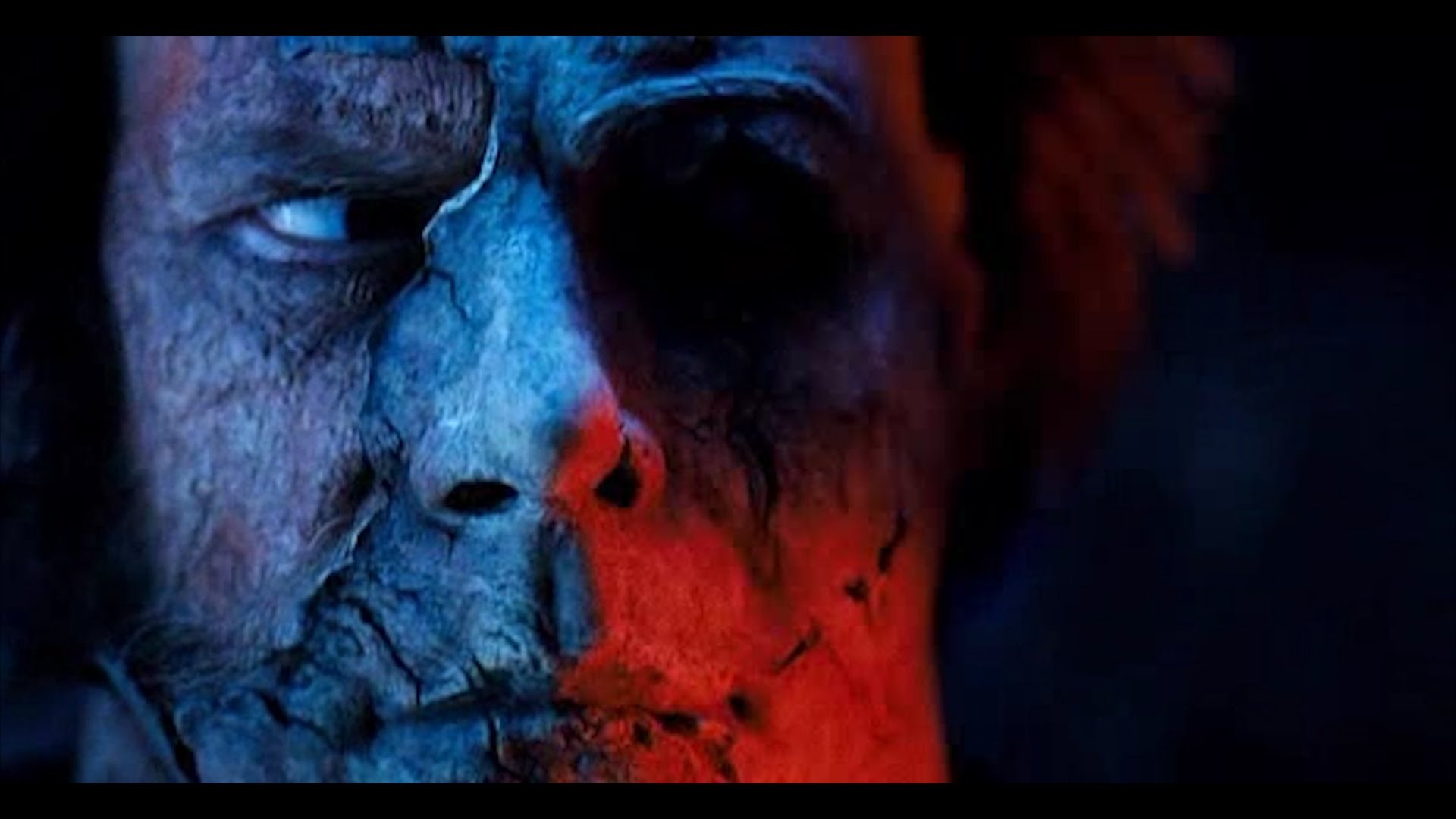 Michael Myers Close-Up with Blue and Red Lighting HD Wallpaper