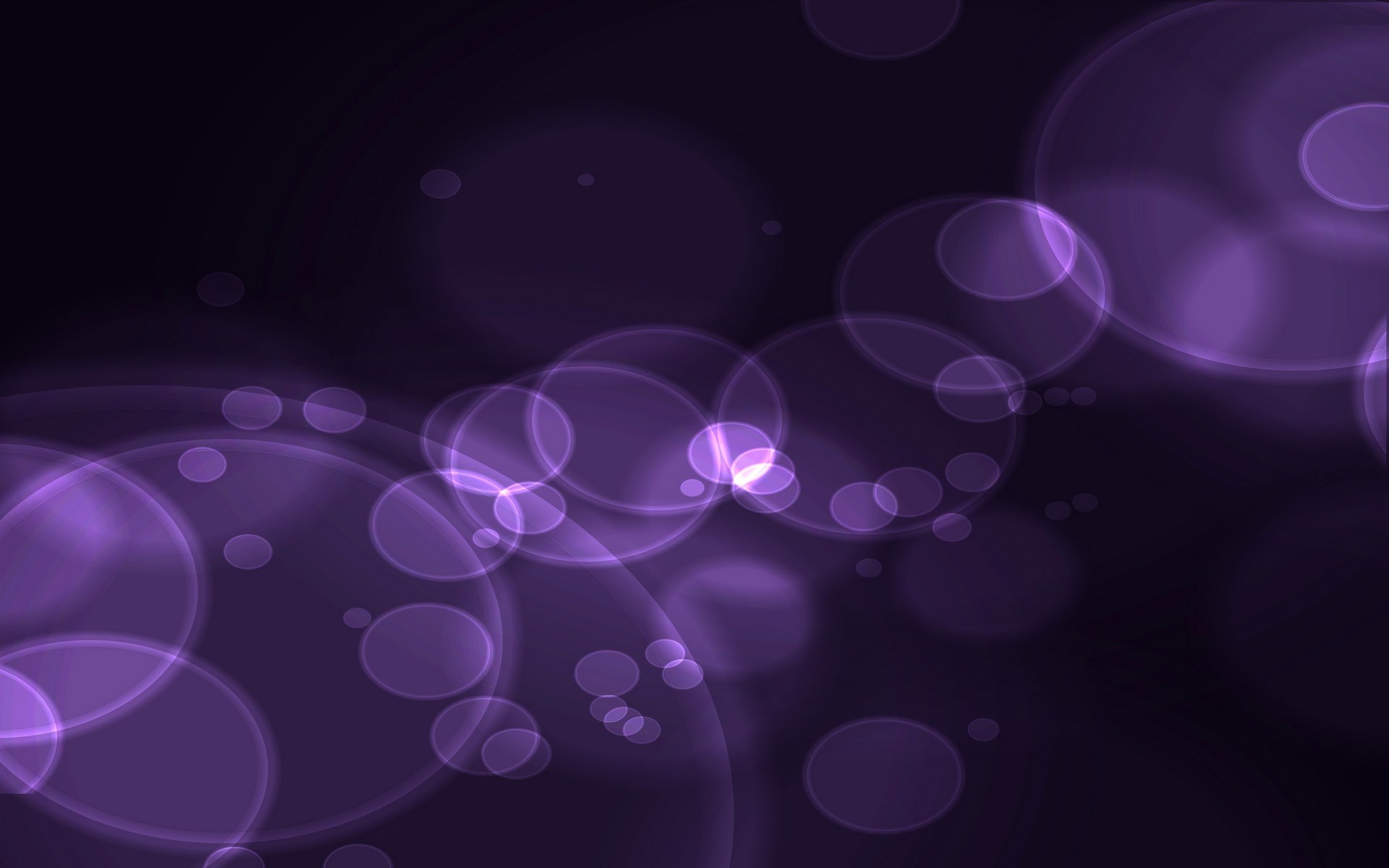 Purple bokeh circles on dark background HD Wallpaper