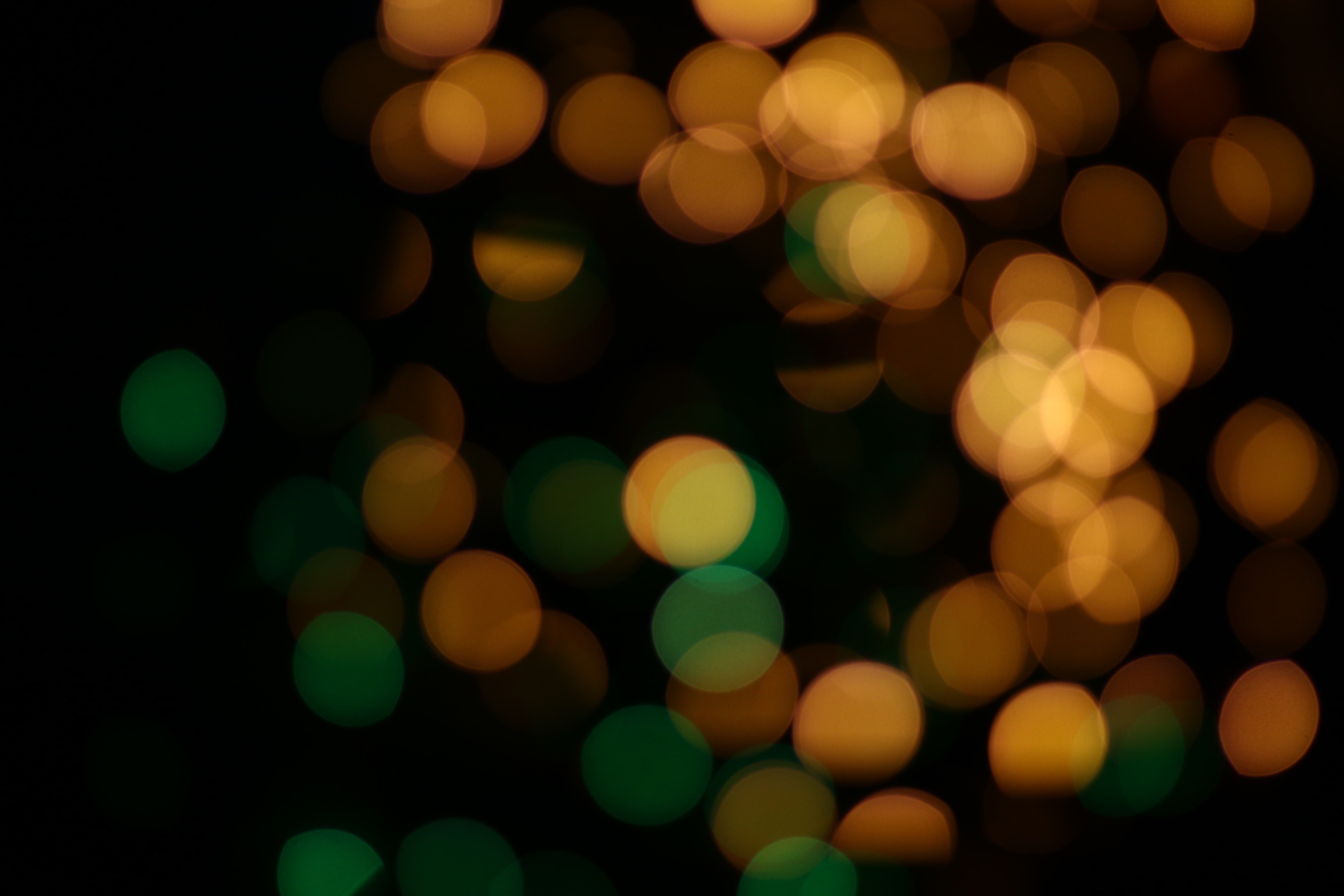 Bokeh lights in orange and green HD Wallpaper