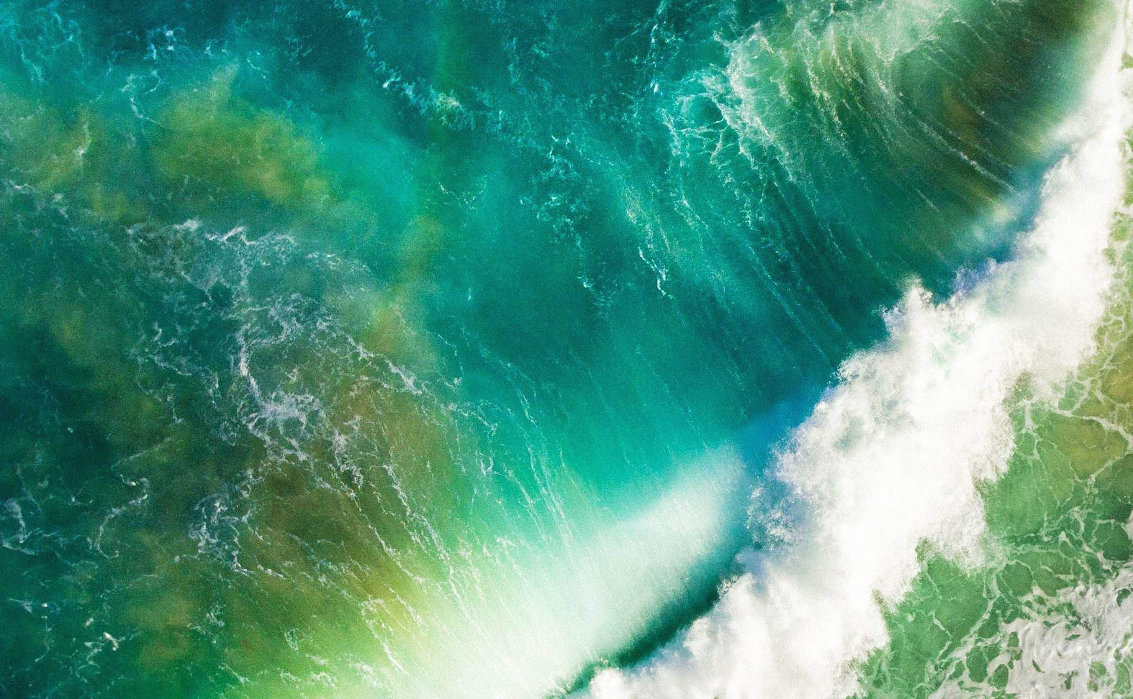 Aerial view of a crashing ocean wave HD Wallpaper