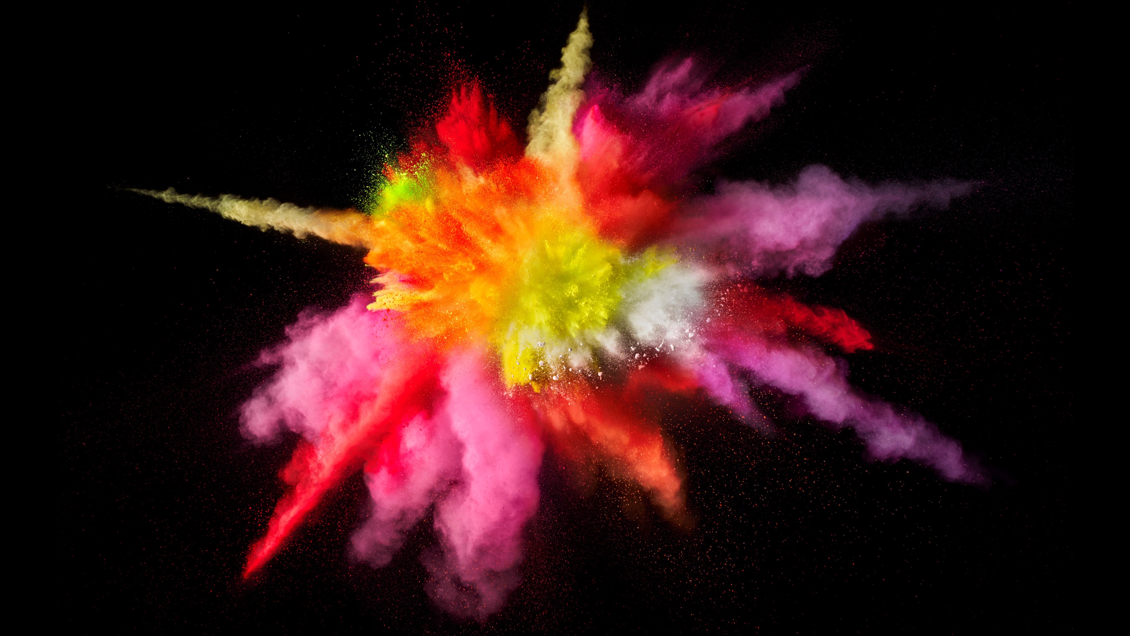 Explosion of colorful powder on black background 4K HD Wallpaper