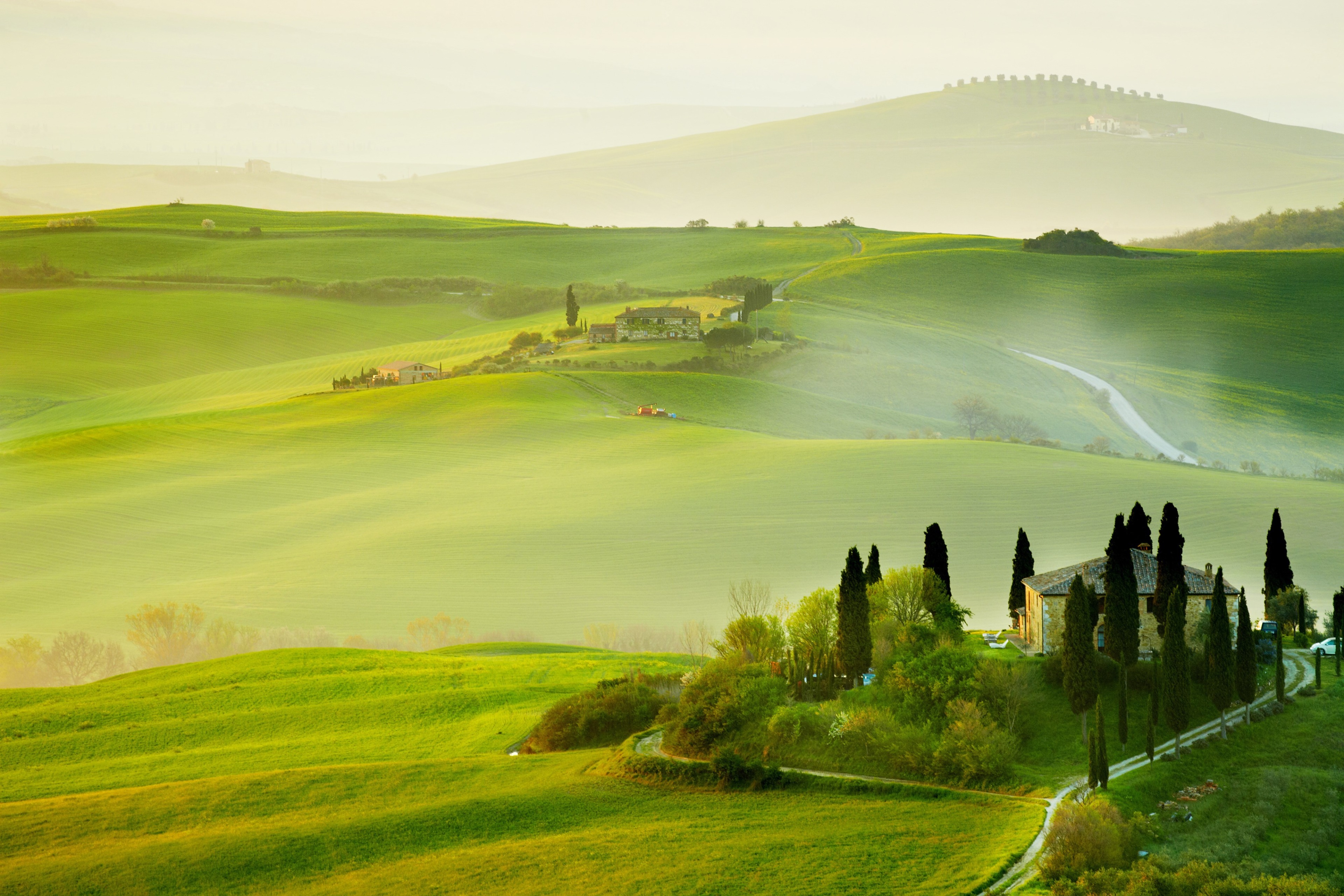 Tuscan Landscape with Farmhouses and Cypress Trees HD Wallpaper