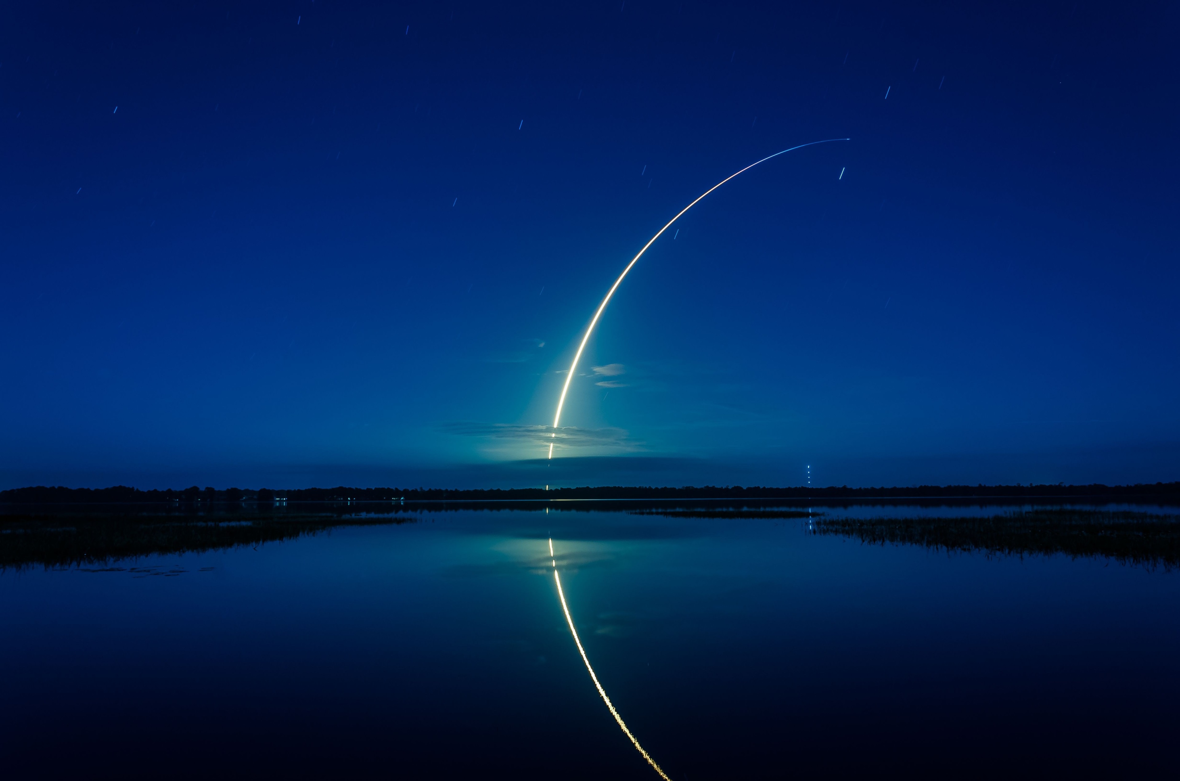Falcon 9 rocket launch over water at night HD Wallpaper