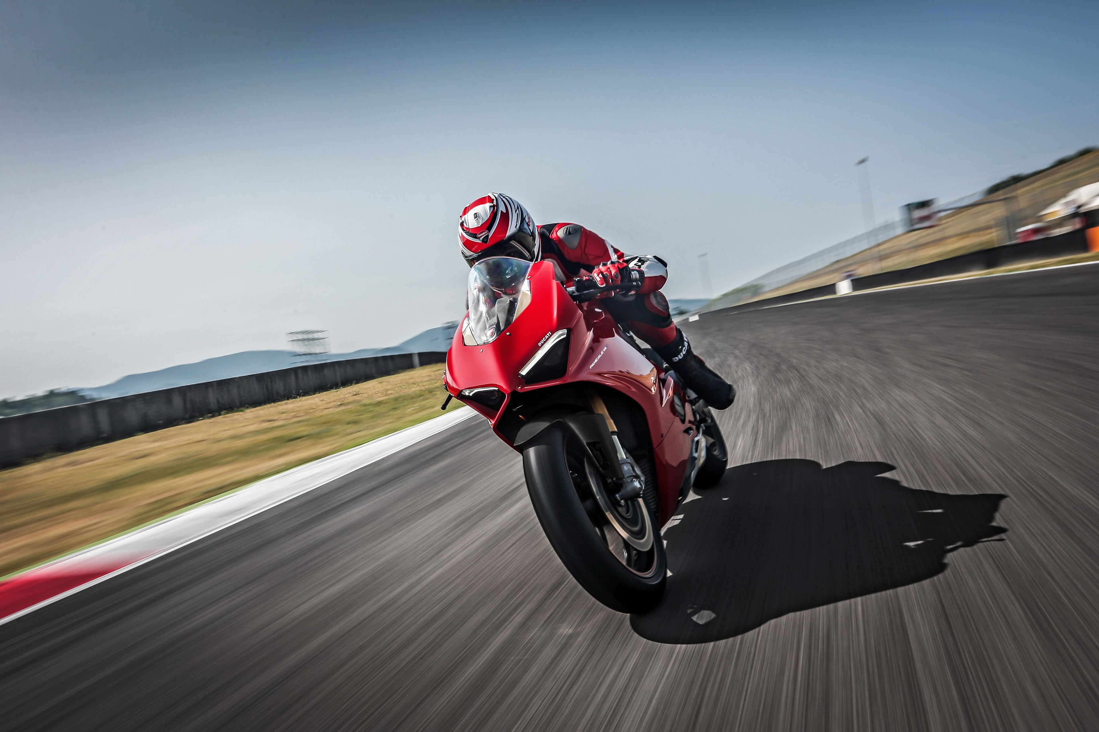 Red Ducati Motorcycle on a Race Track HD Wallpaper