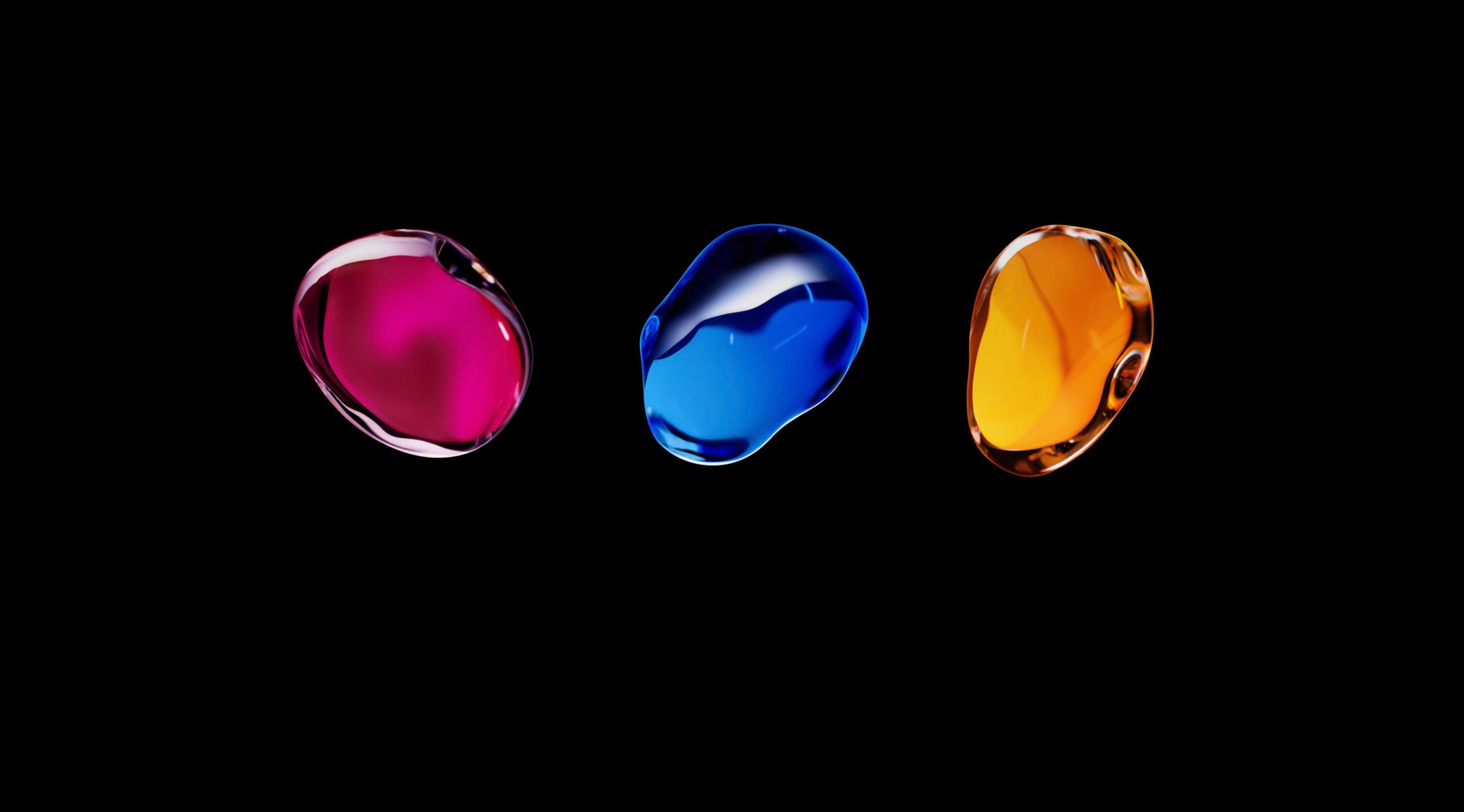 Three colorful liquid drops on black background 4K HD Wallpaper