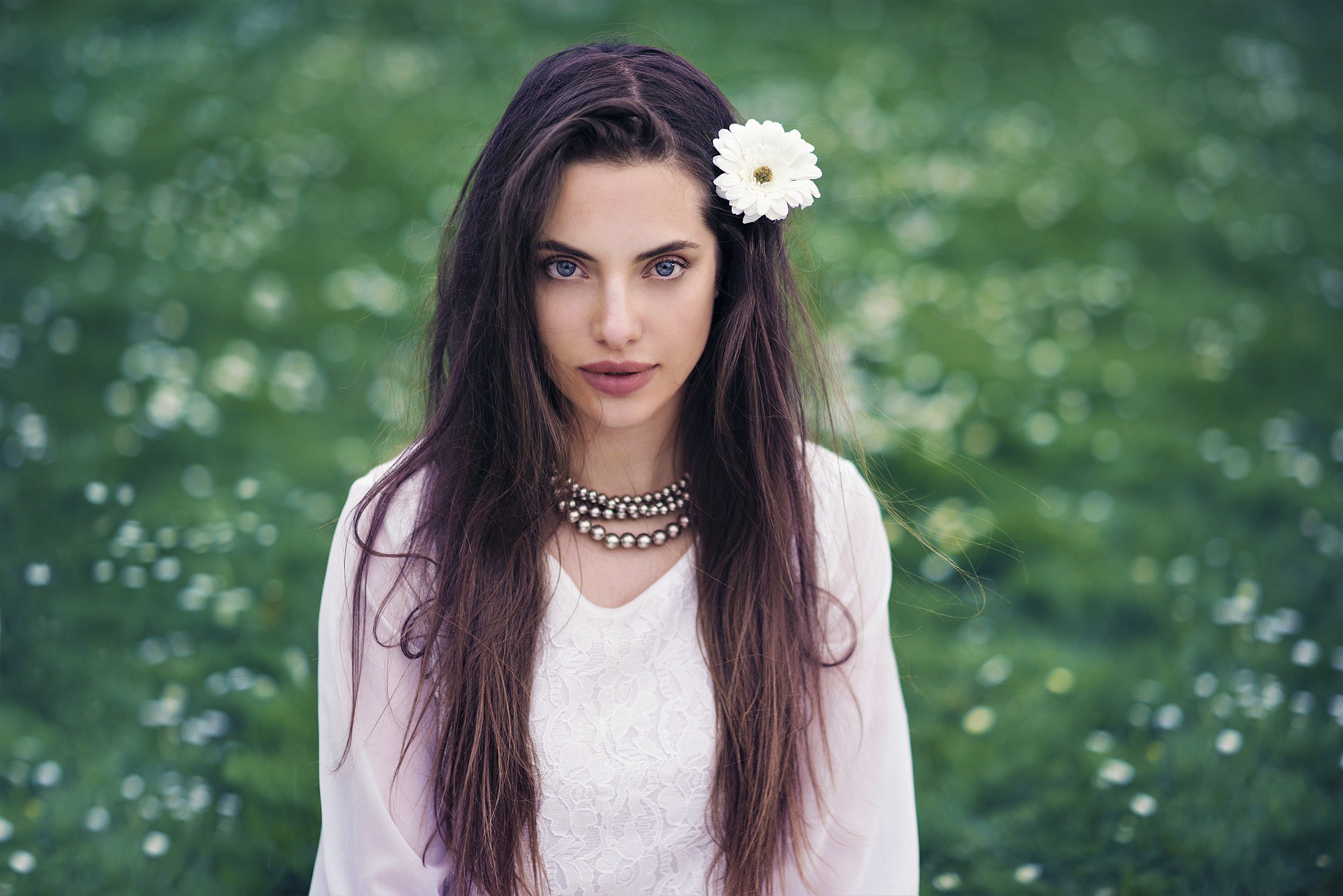 4K Portrait of Woman with Flower in Hair HD Wallpaper