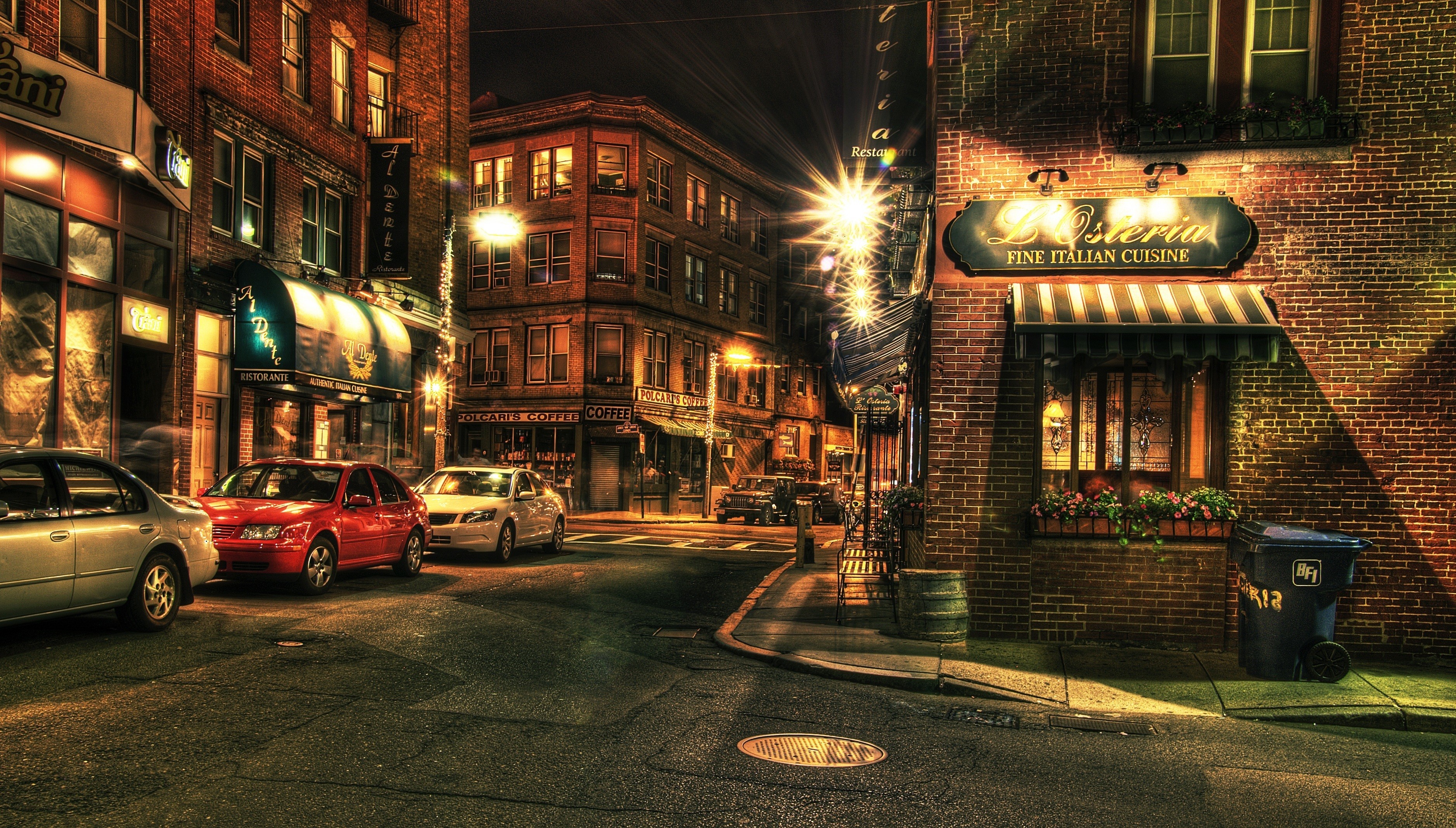 Night street scene with cars and restaurants in Boston HD Wallpaper