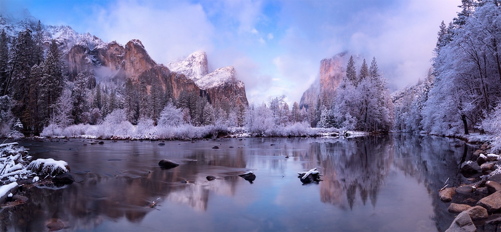 Winter landscape of Yosemite National Park with snow-covered mountains and river HD Wallpaper