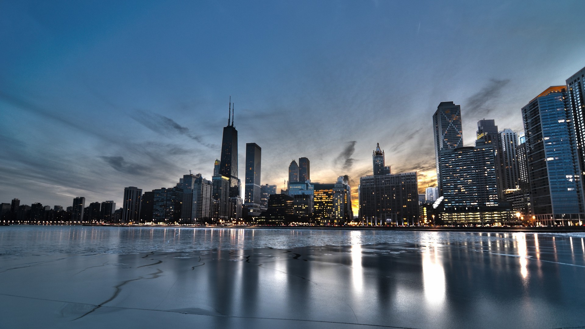 Chicago skyline at dusk over frozen lake HD Wallpaper