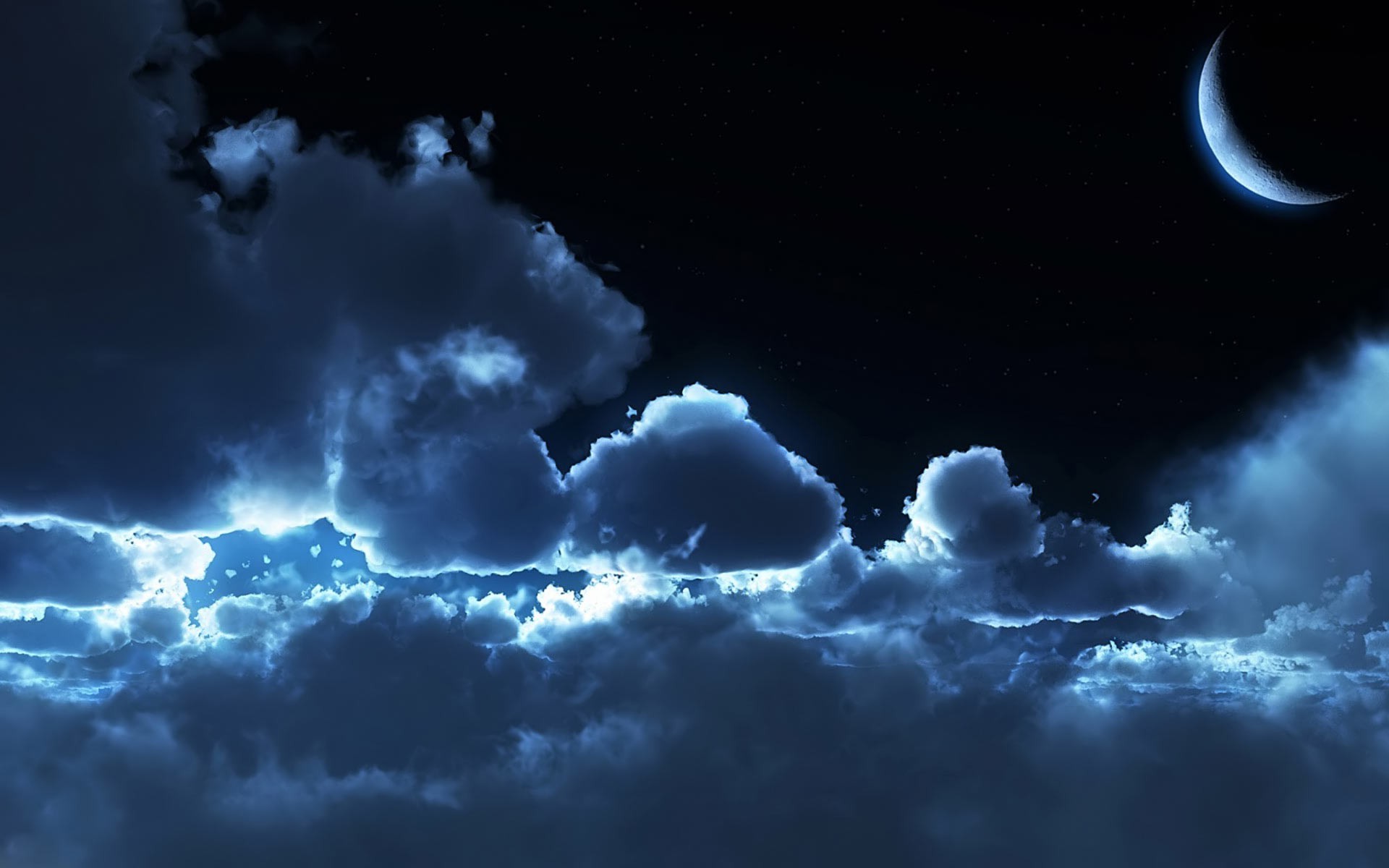 Crescent moon in a cloudy night sky HD Wallpaper