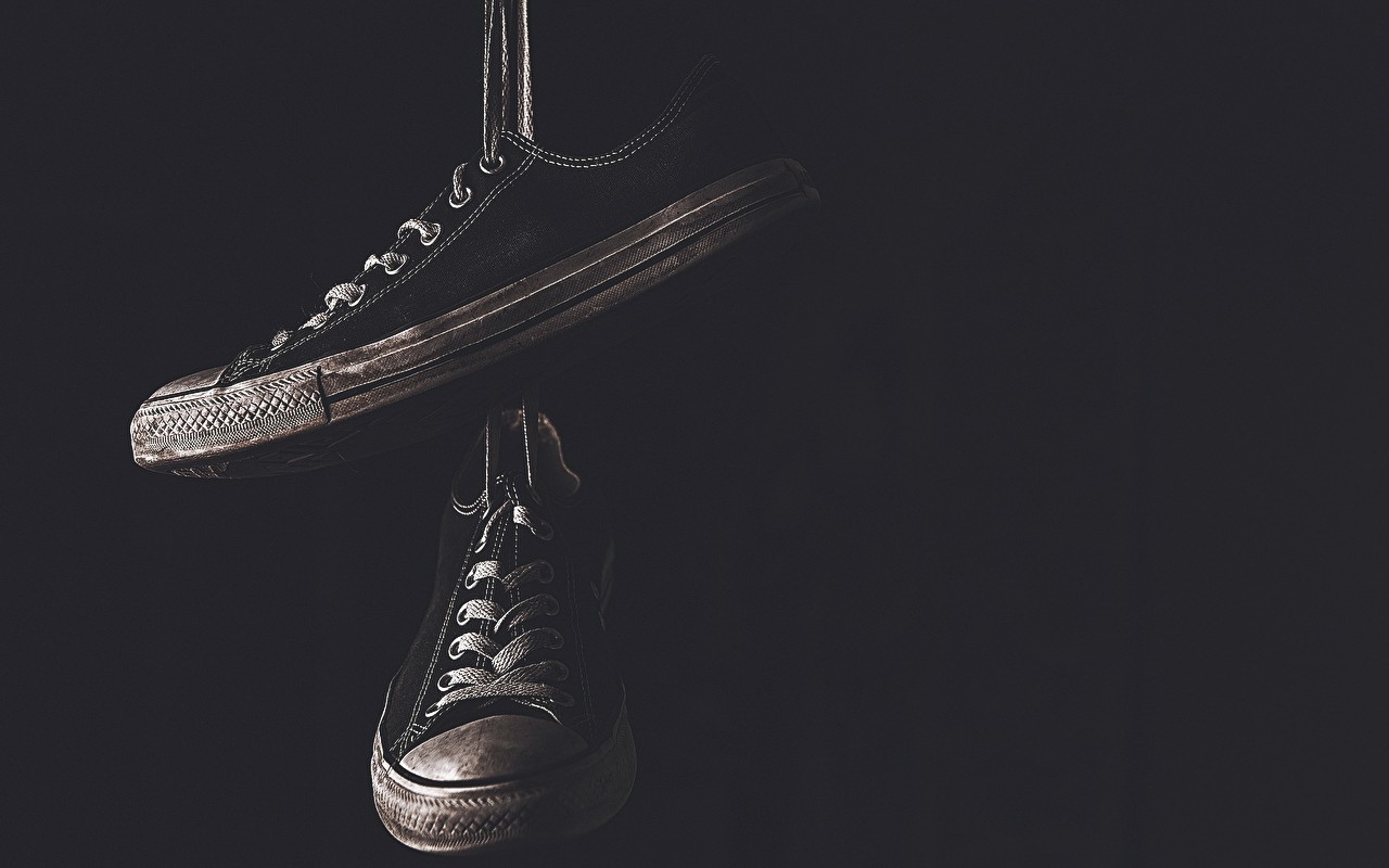 Pair of black Converse Chuck Taylor All-Stars hanging HD Wallpaper