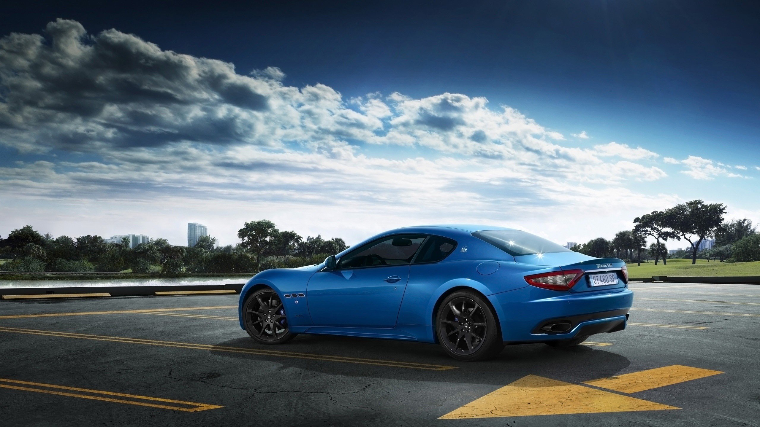 Blue Maserati GranTurismo Sport parked outdoors HD Wallpaper