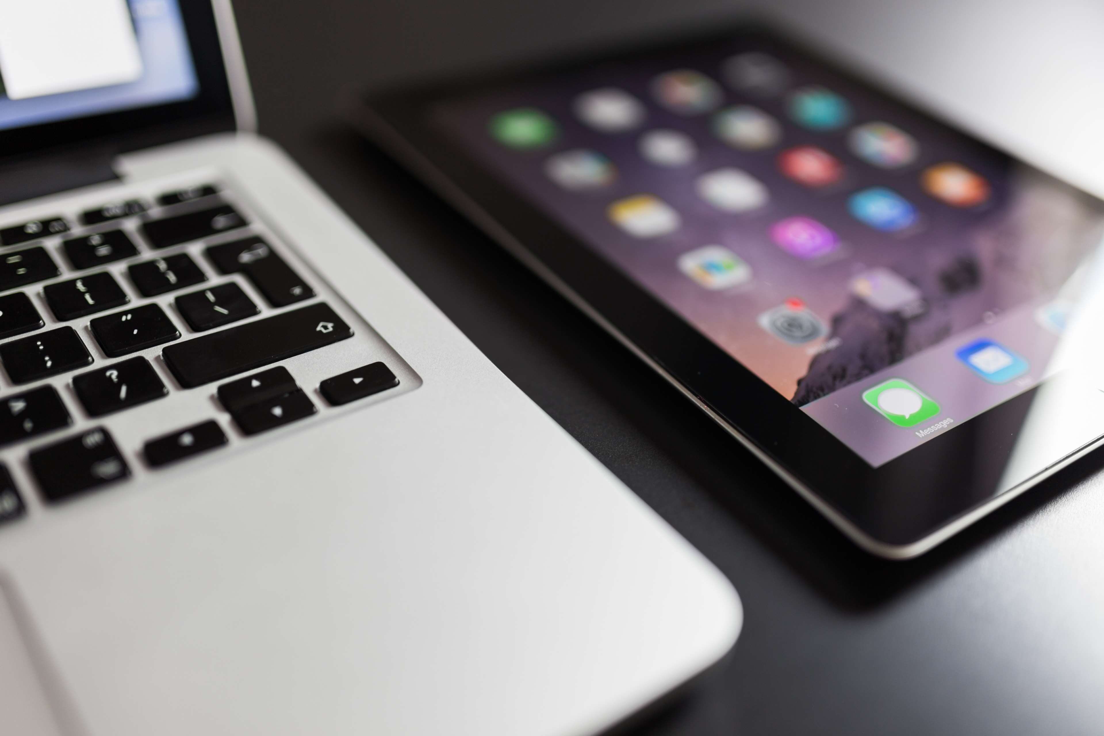 MacBook and iPad with App Icons 4K HD Wallpaper