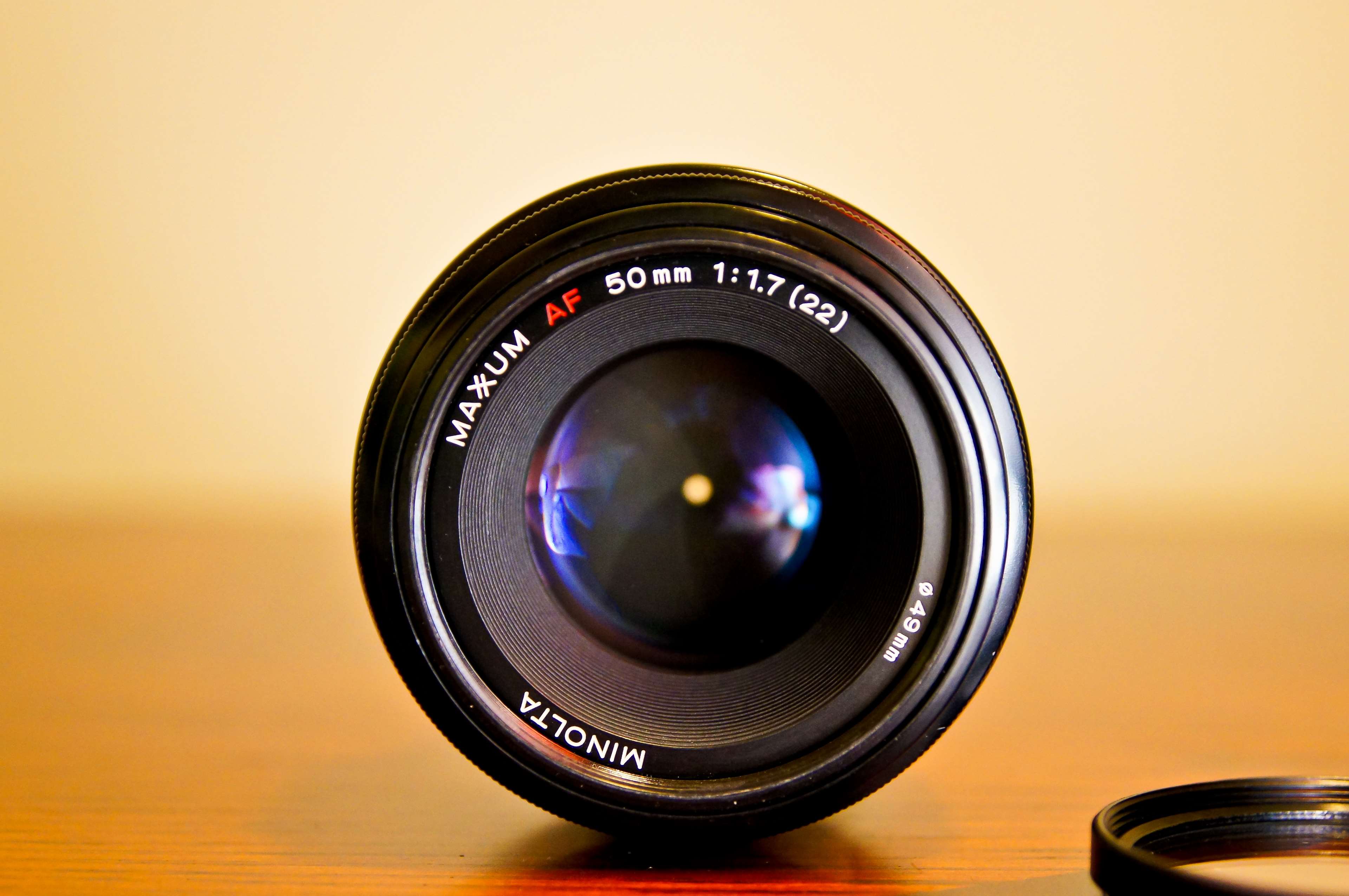 Minolta Maxxum AF 50mm 1:1.7 camera lens HD Wallpaper