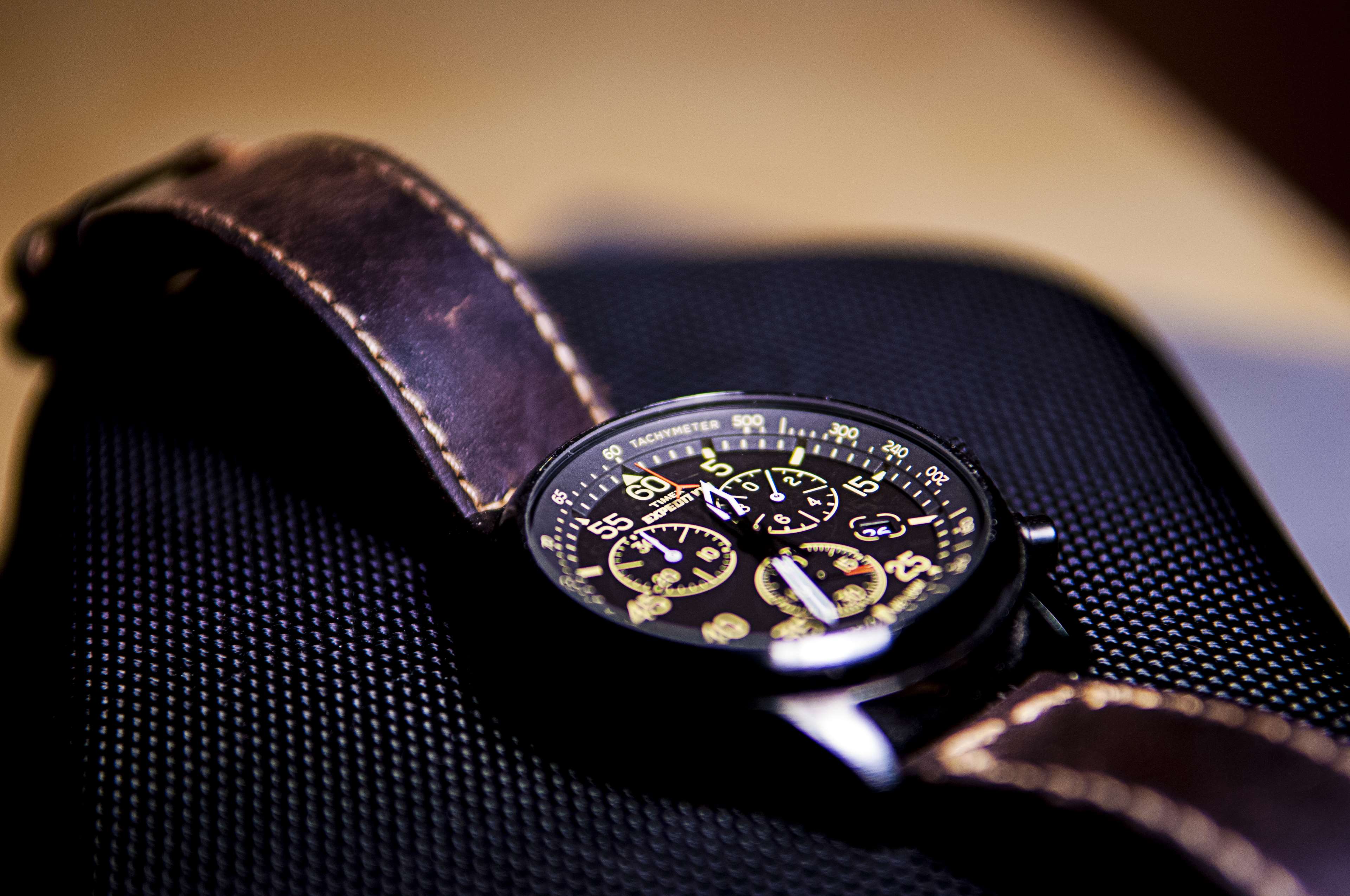 Close up of a luxury chronograph watch with leather strap HD Wallpaper