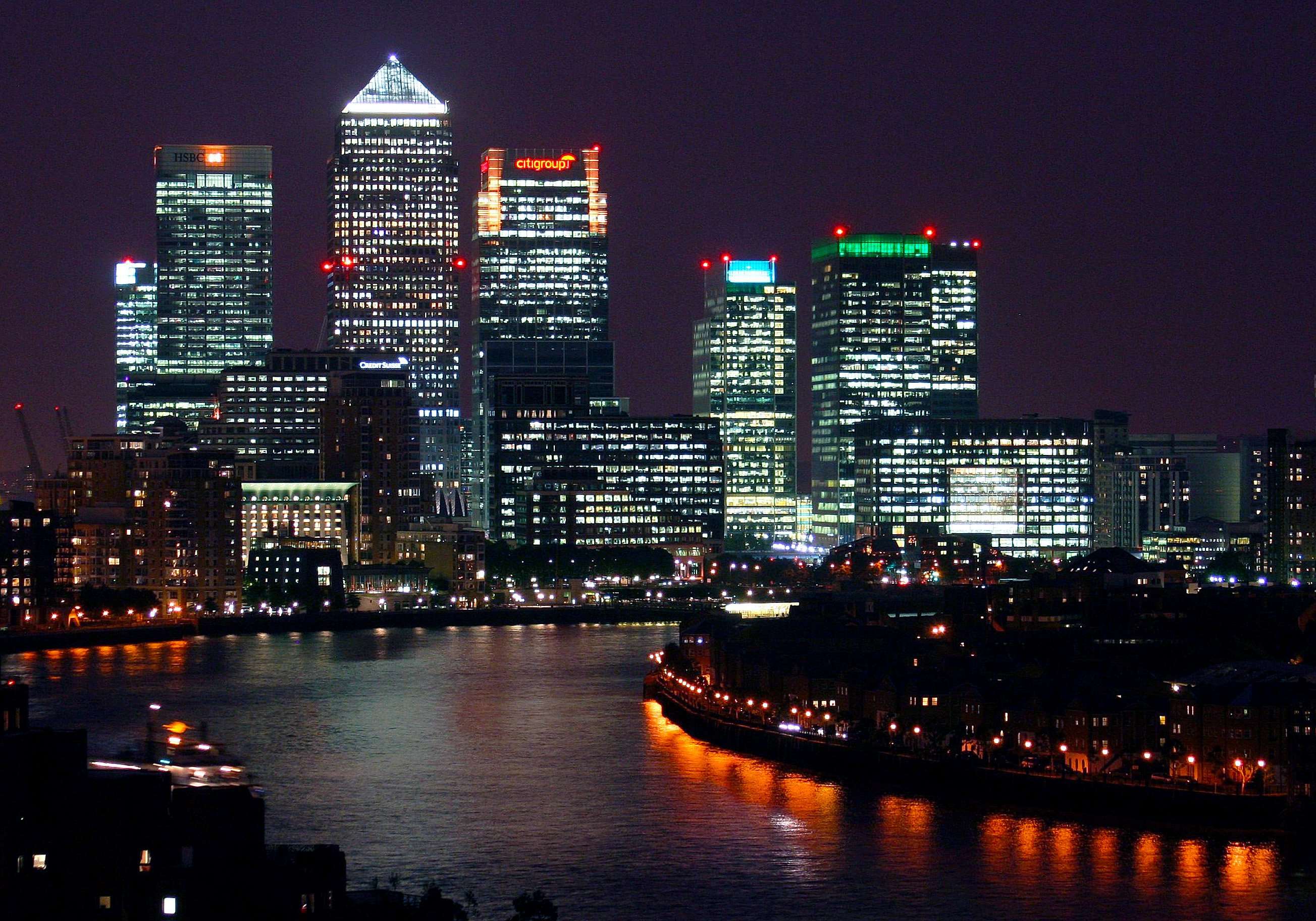 Canary Wharf skyscrapers at night with river HD Wallpaper