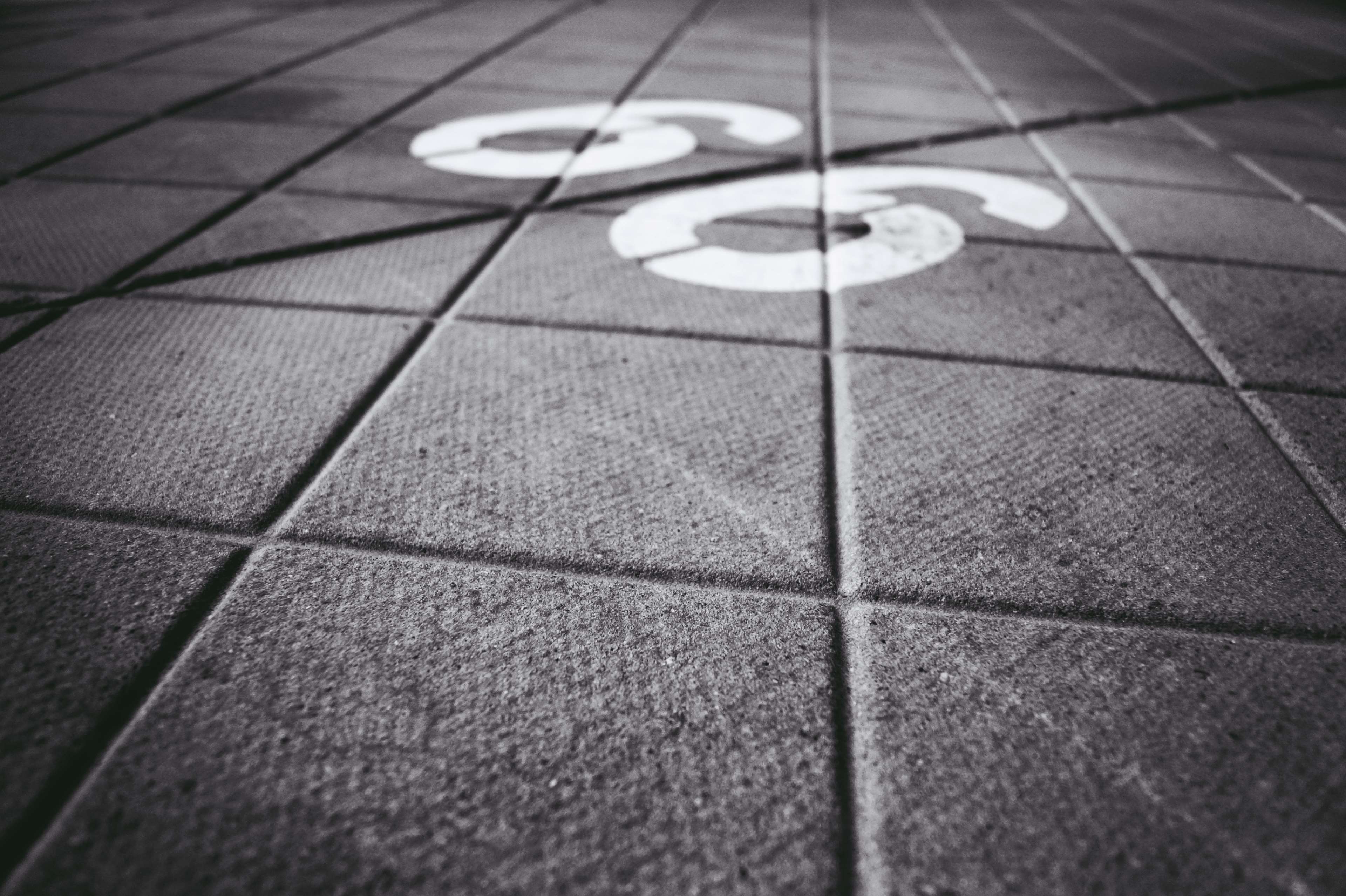 Number 66 on a tiled pavement HD Wallpaper