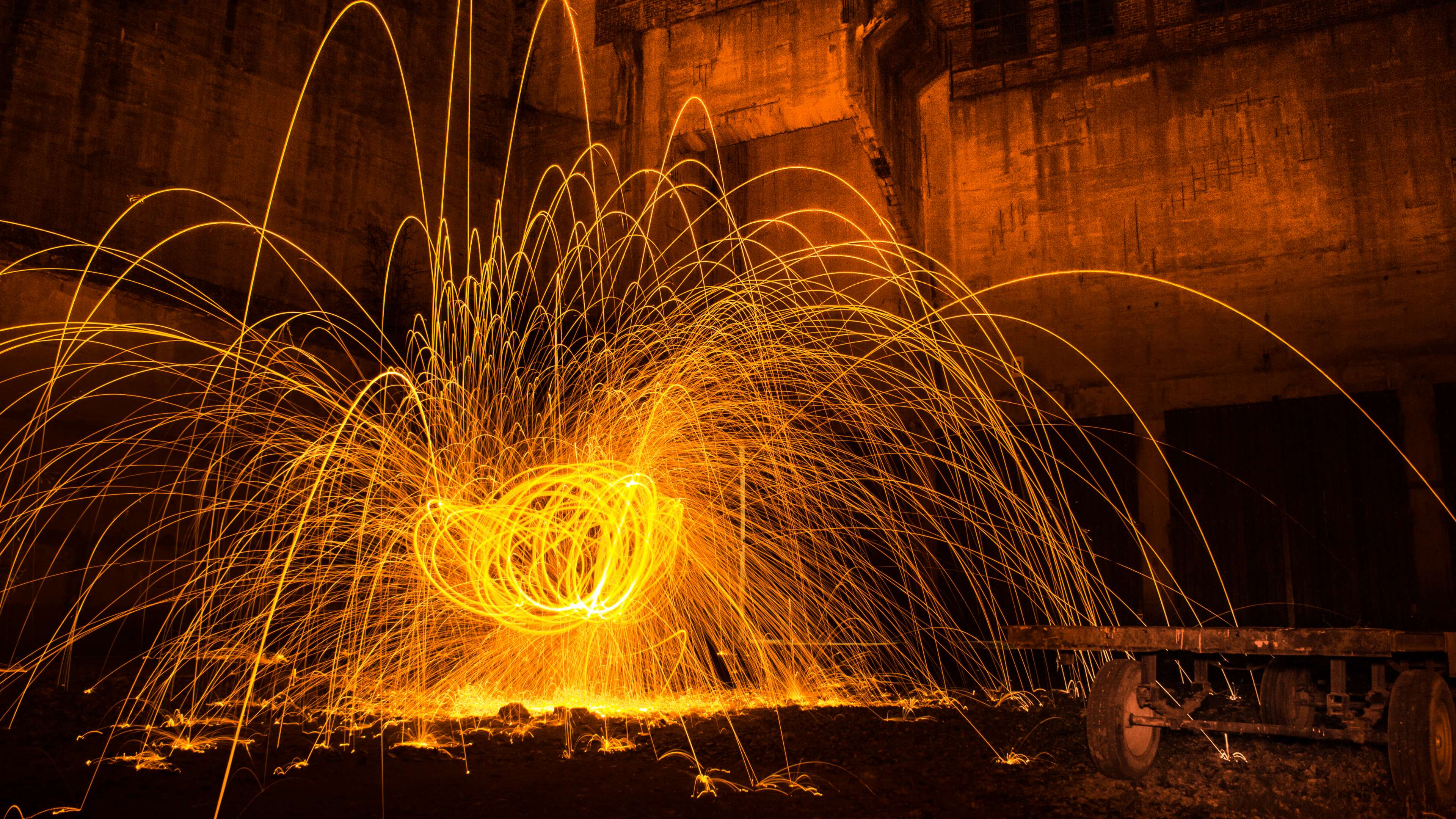 Long exposure photography of steel wool sparks HD Wallpaper
