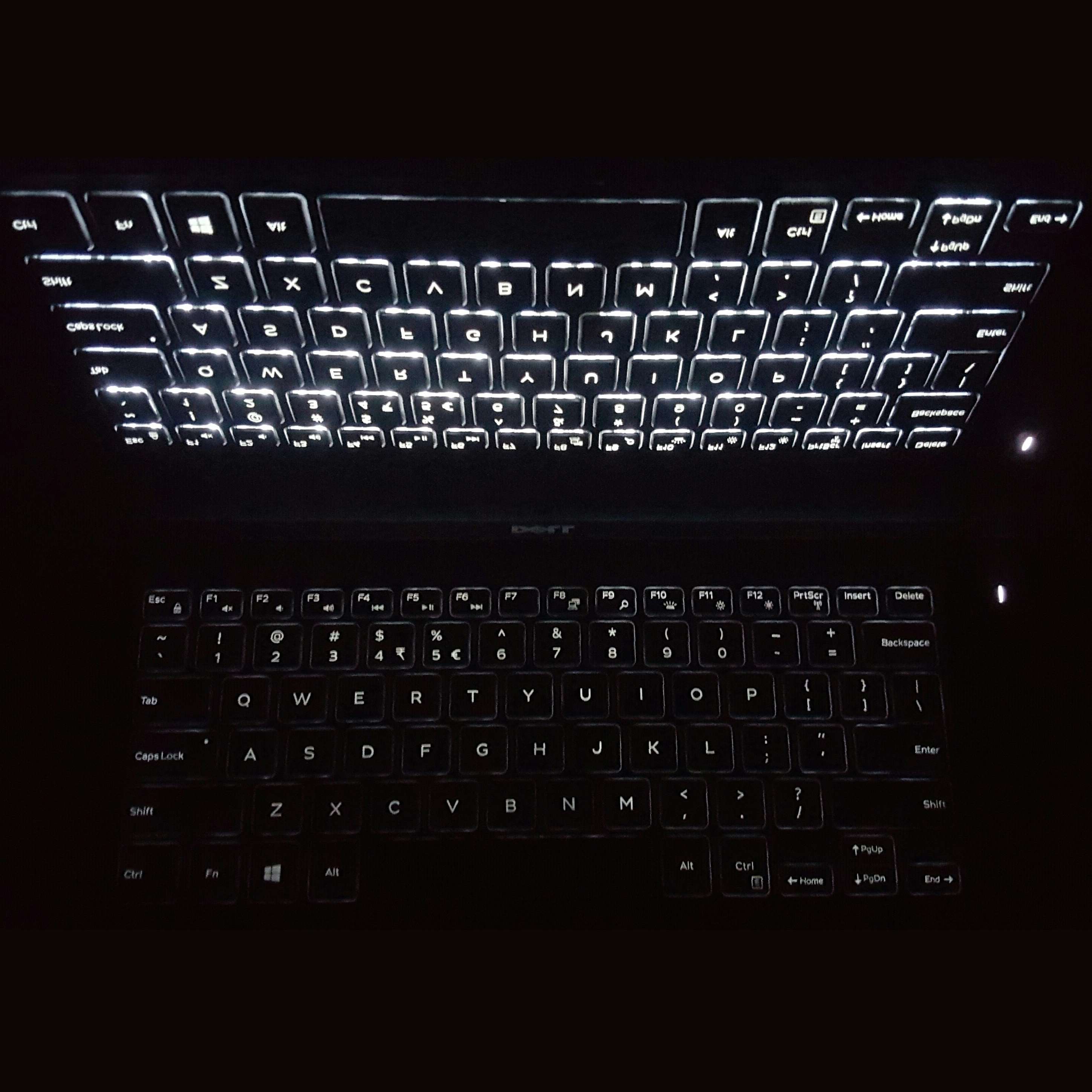 Illuminated laptop keyboard at night HD Wallpaper