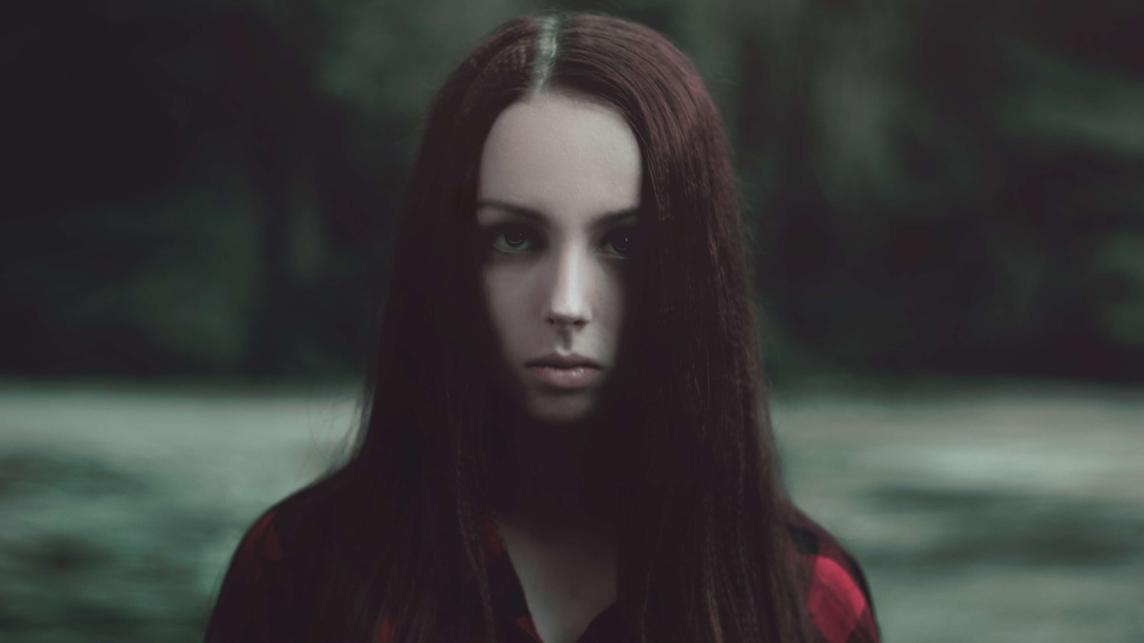 Woman with dark hair and red shirt portrait HD Wallpaper